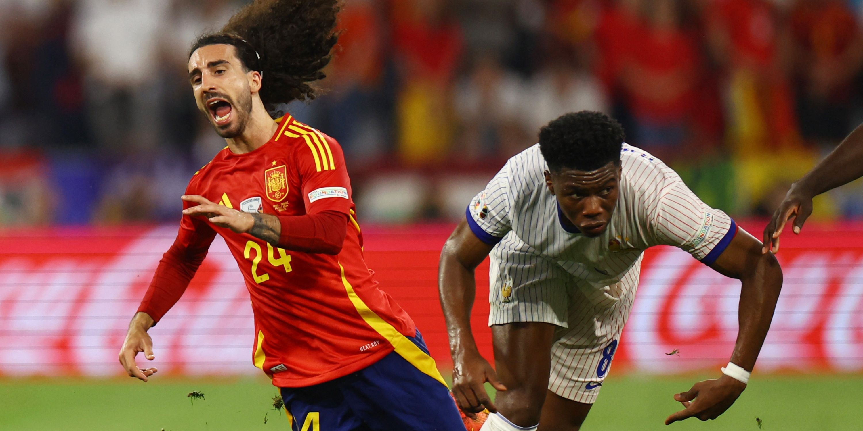 Spain's Marc Cucurella in action with France's Aurelien Tchouameni