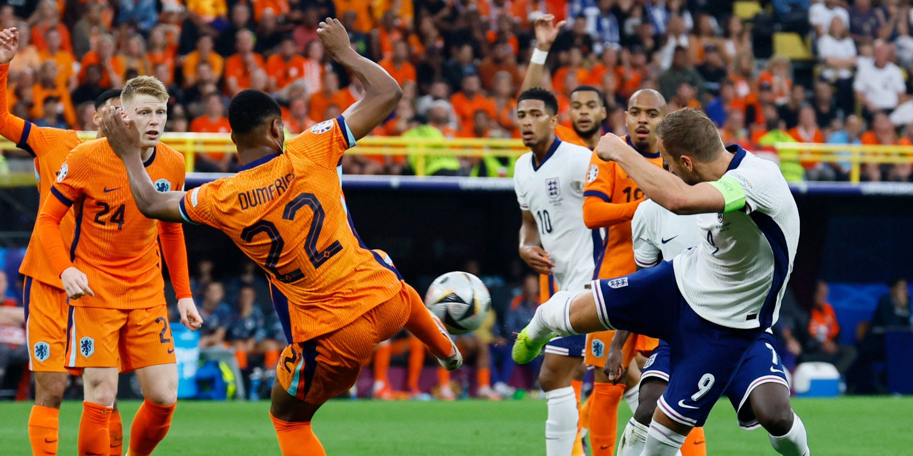 Netherlands' Denzel Dumfries concedes a penalty against England's Harry Kane