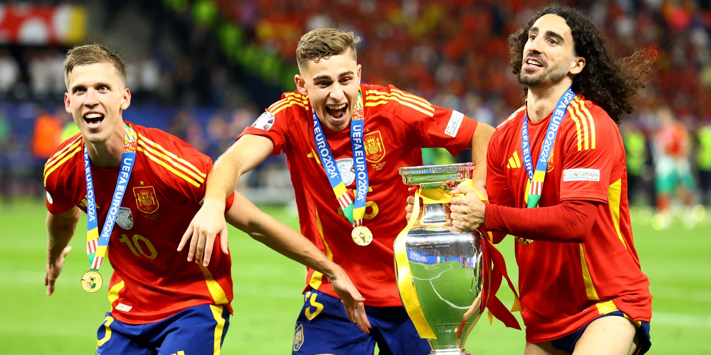 Spain's Dani Olmo, Marc Cucurella and Fermin Lopez celebrate