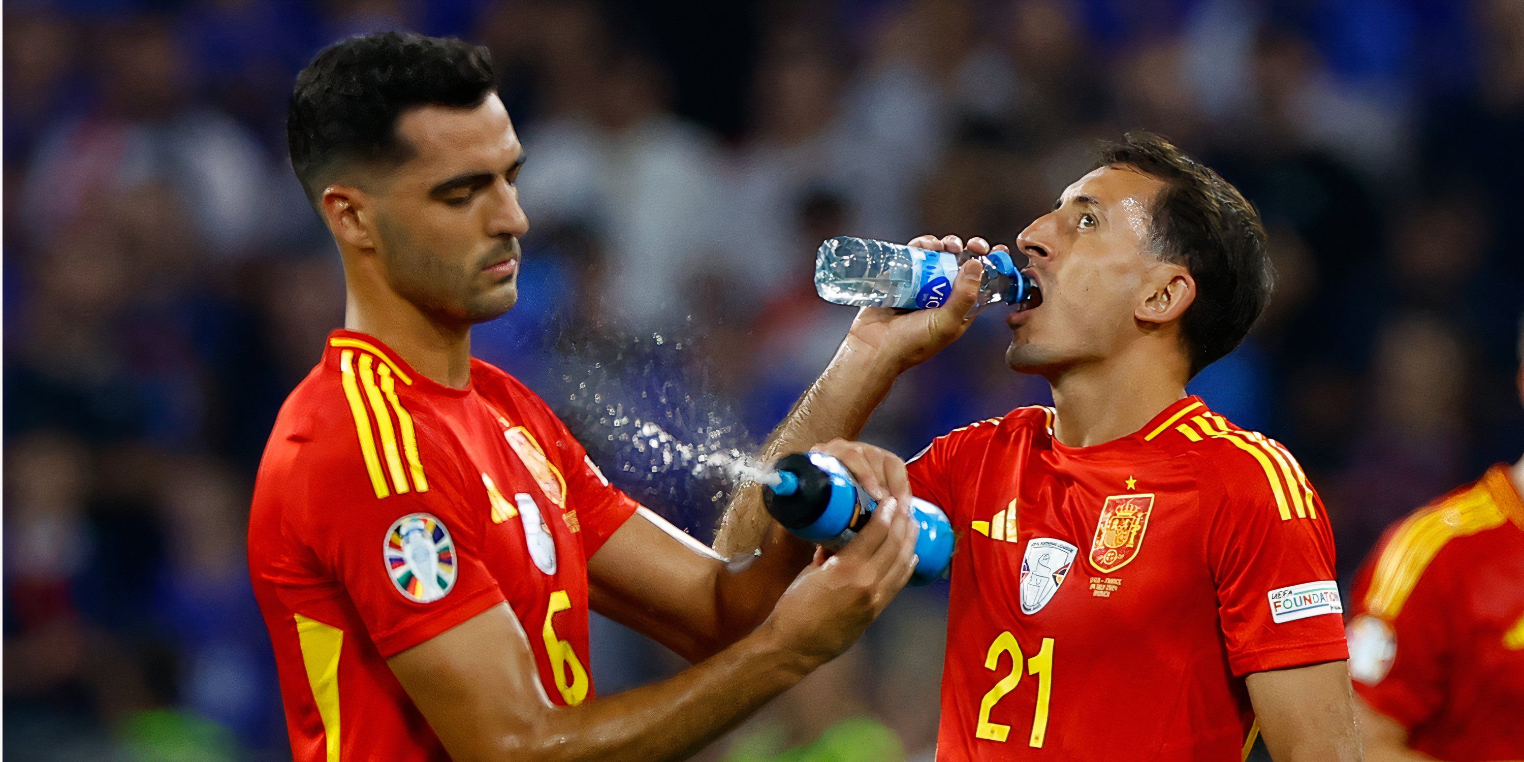 Mikel Oyarzabal & Mikel Merino of Spain drink water