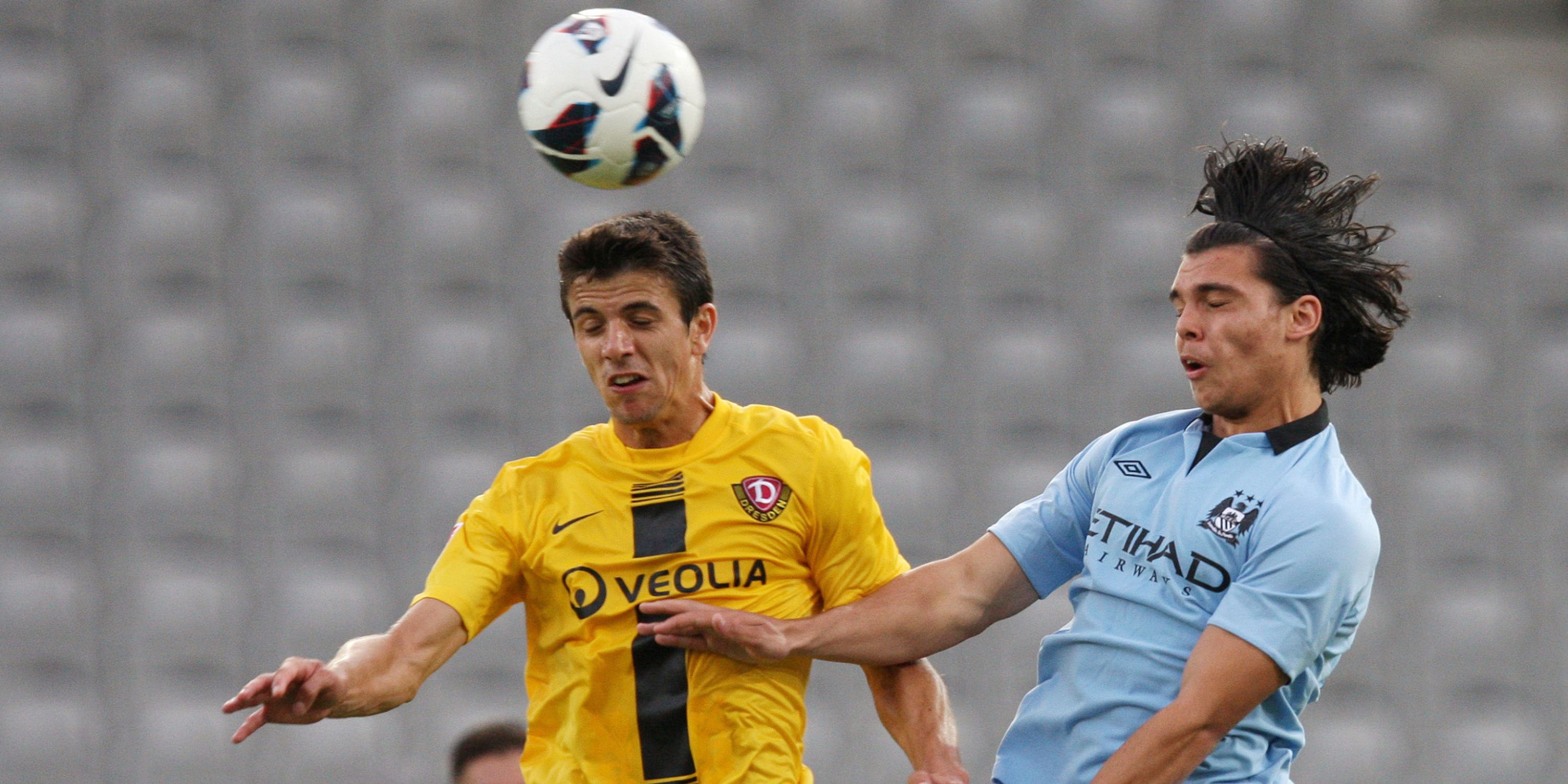 Omar Rekik in action for Manchester City