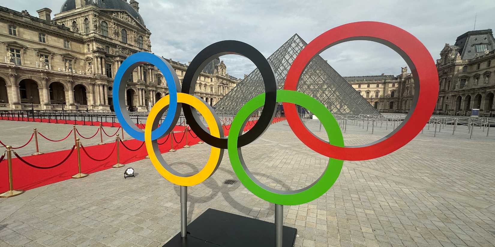 The Olympic rings outside the Louvre
