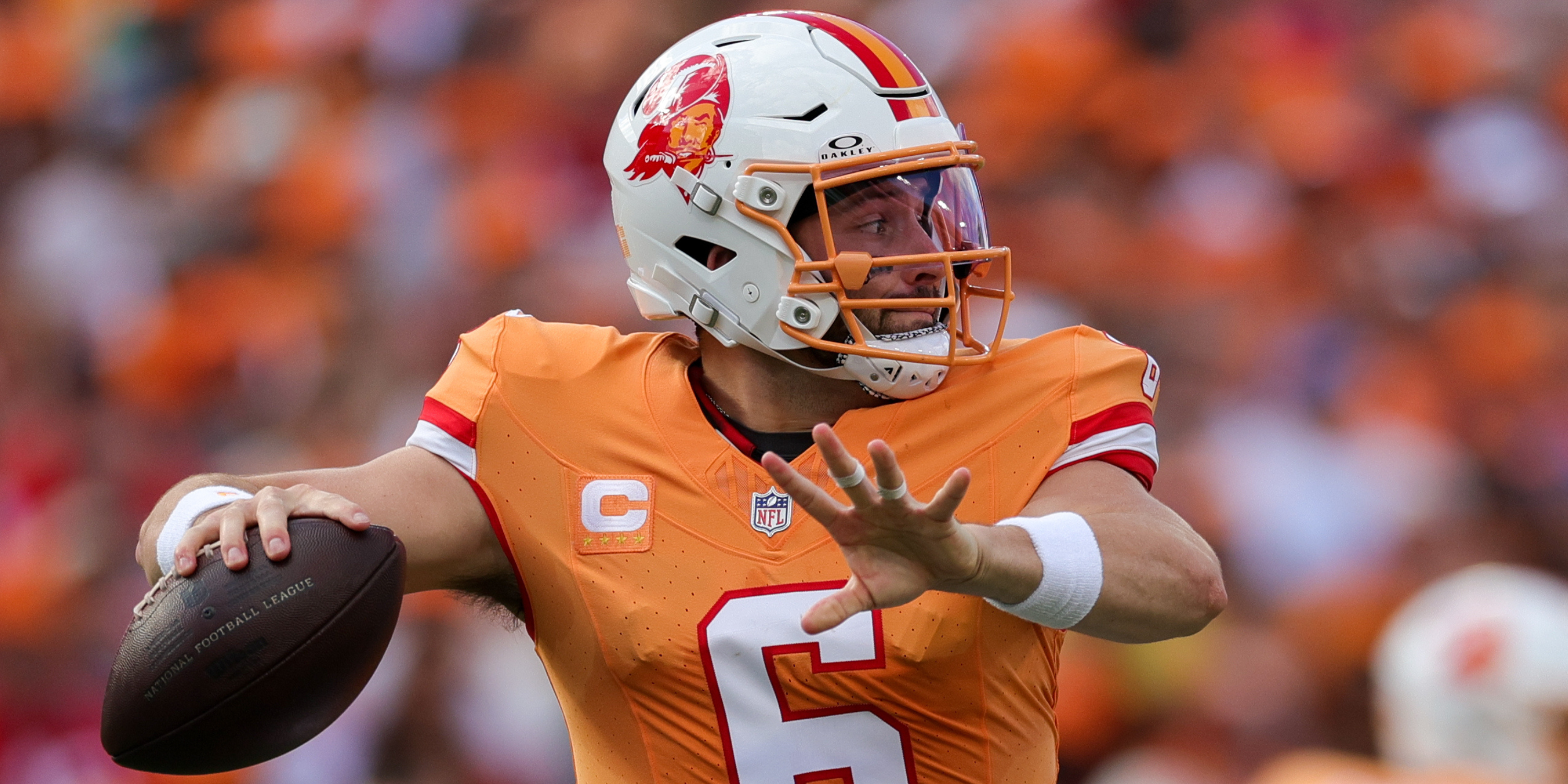 Baker Mayfield Throwing in Creamsicle Uniform