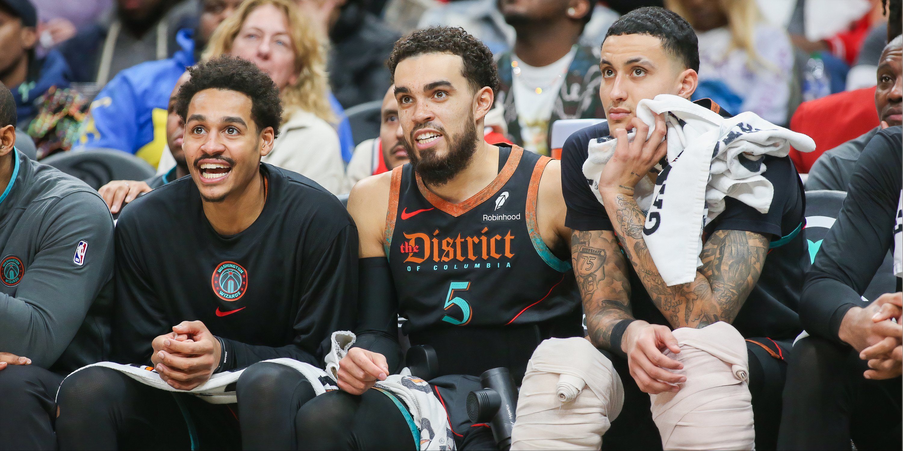 Jordan Poole, Tyus Jones and Kyle Kuzma