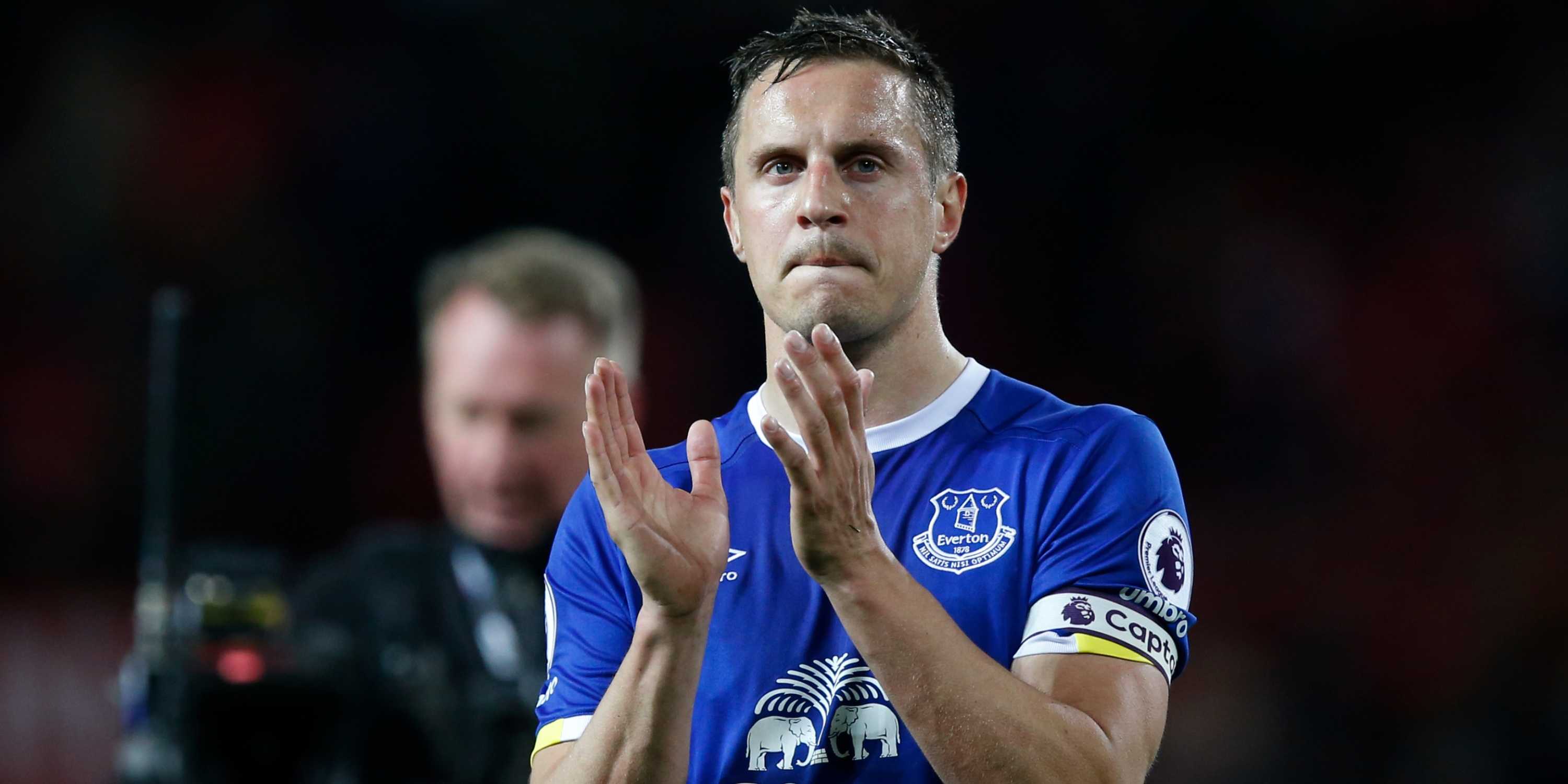 Everton's Phil Jagielka applauds fans after the match