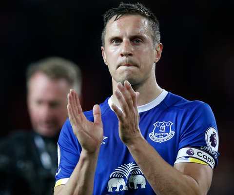 Everton's Phil Jagielka applauds fans after the match