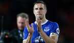 Everton's Phil Jagielka applauds fans after the match