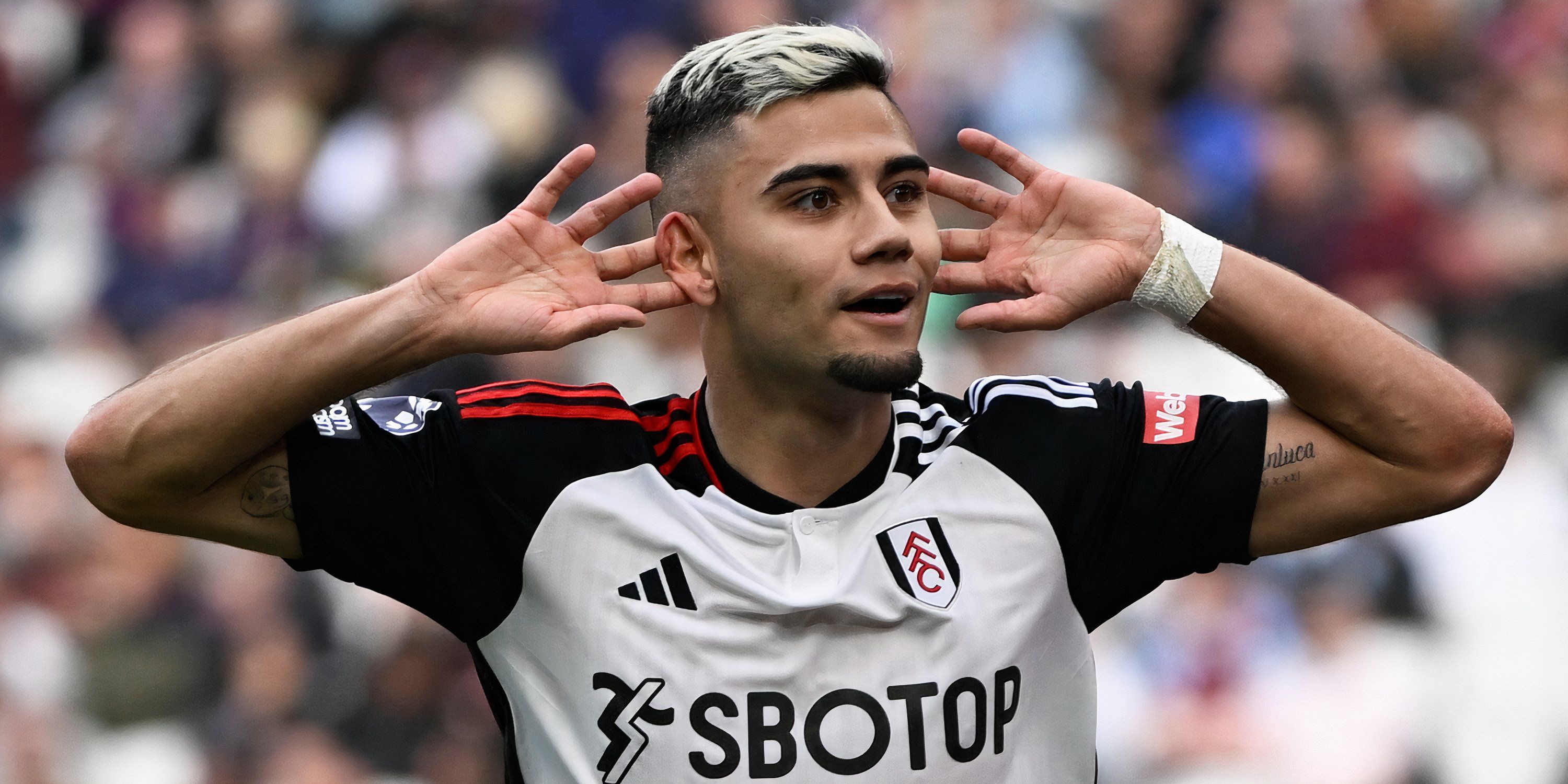 Fulham creative midfielder Andreas Pereira celebrating