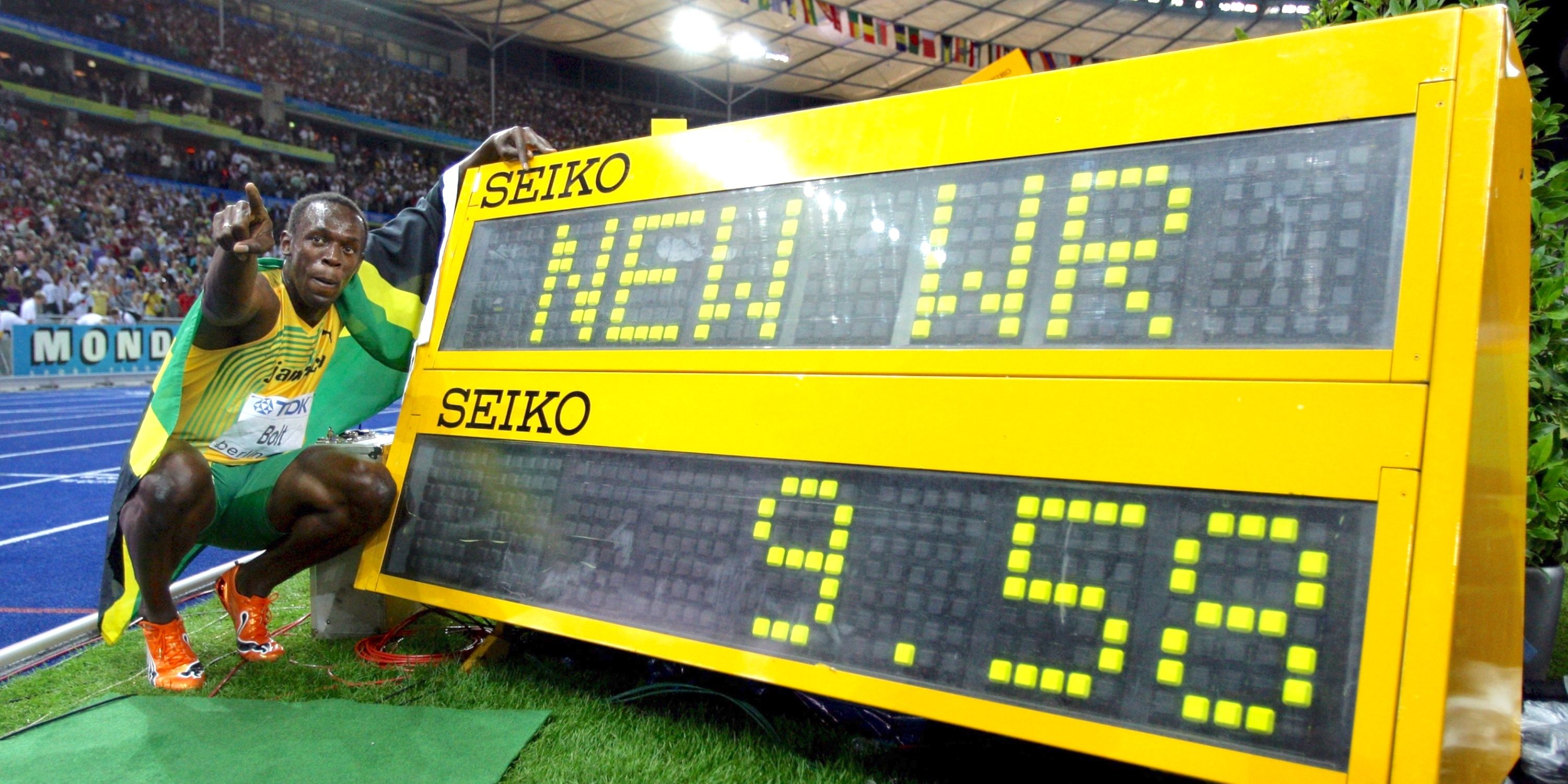 Usain Bolt celebrates world record 100m time