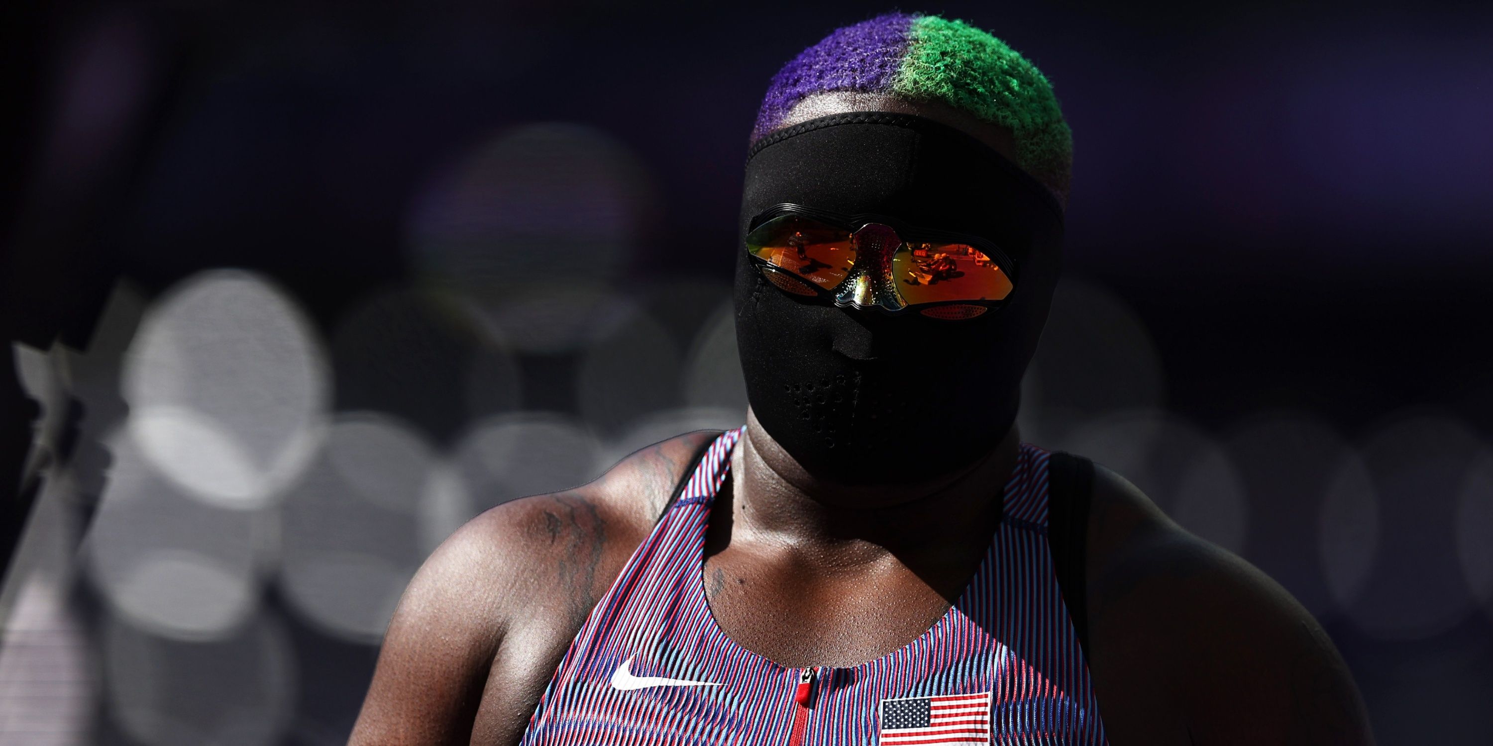 Why American Shot Putter Wears Full Face Mask at the Olympics