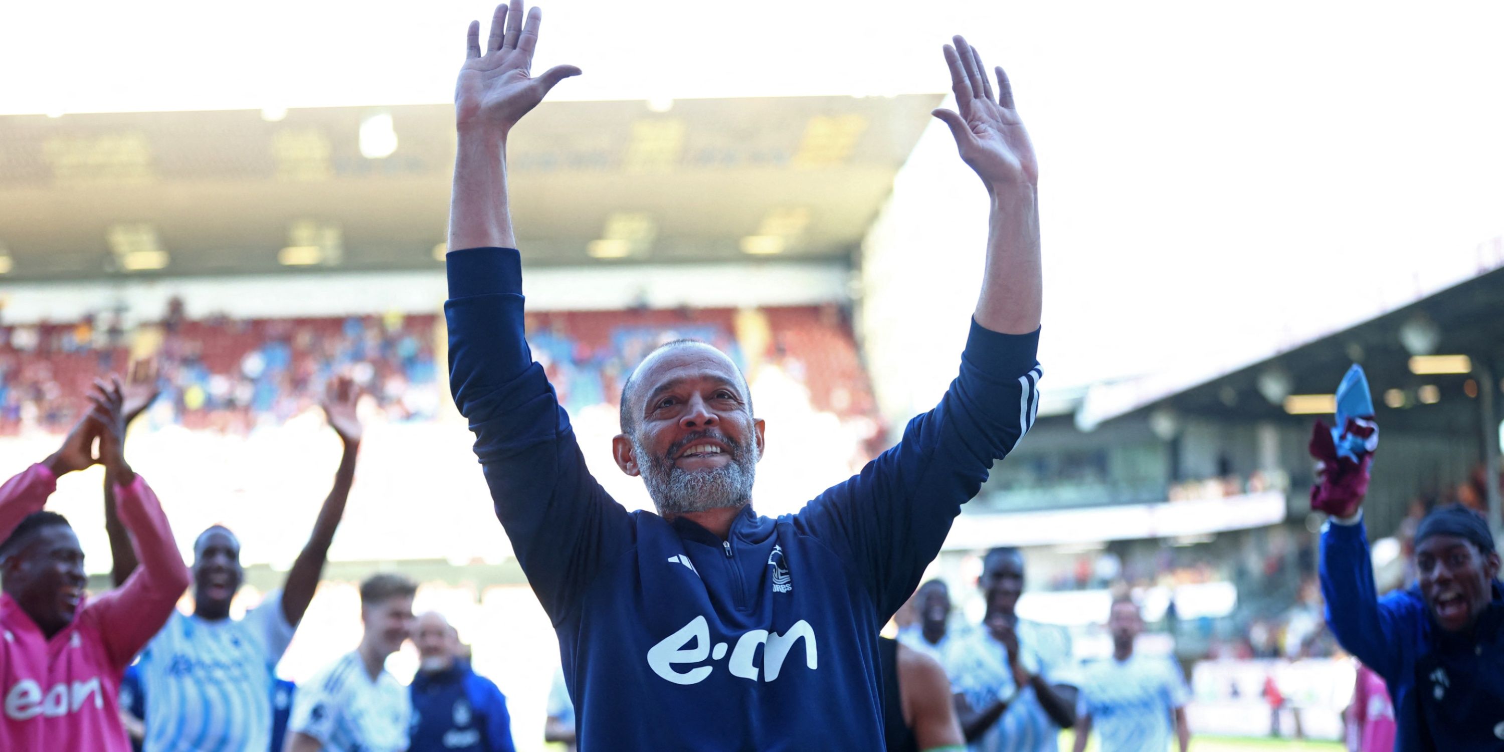 Nuno Espirito Santo holds his hands out for fans