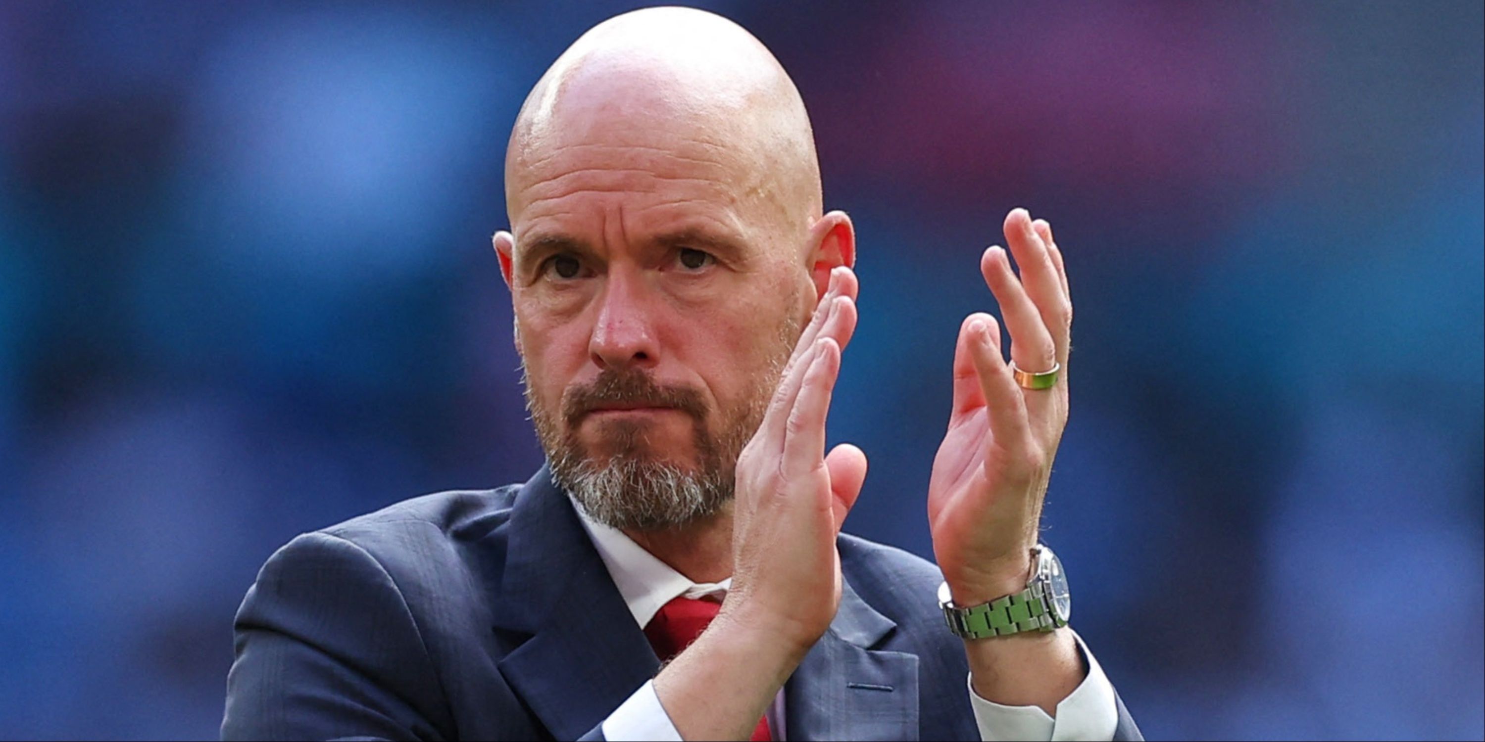 Manchester United boss Erik ten Hag applauding supporters