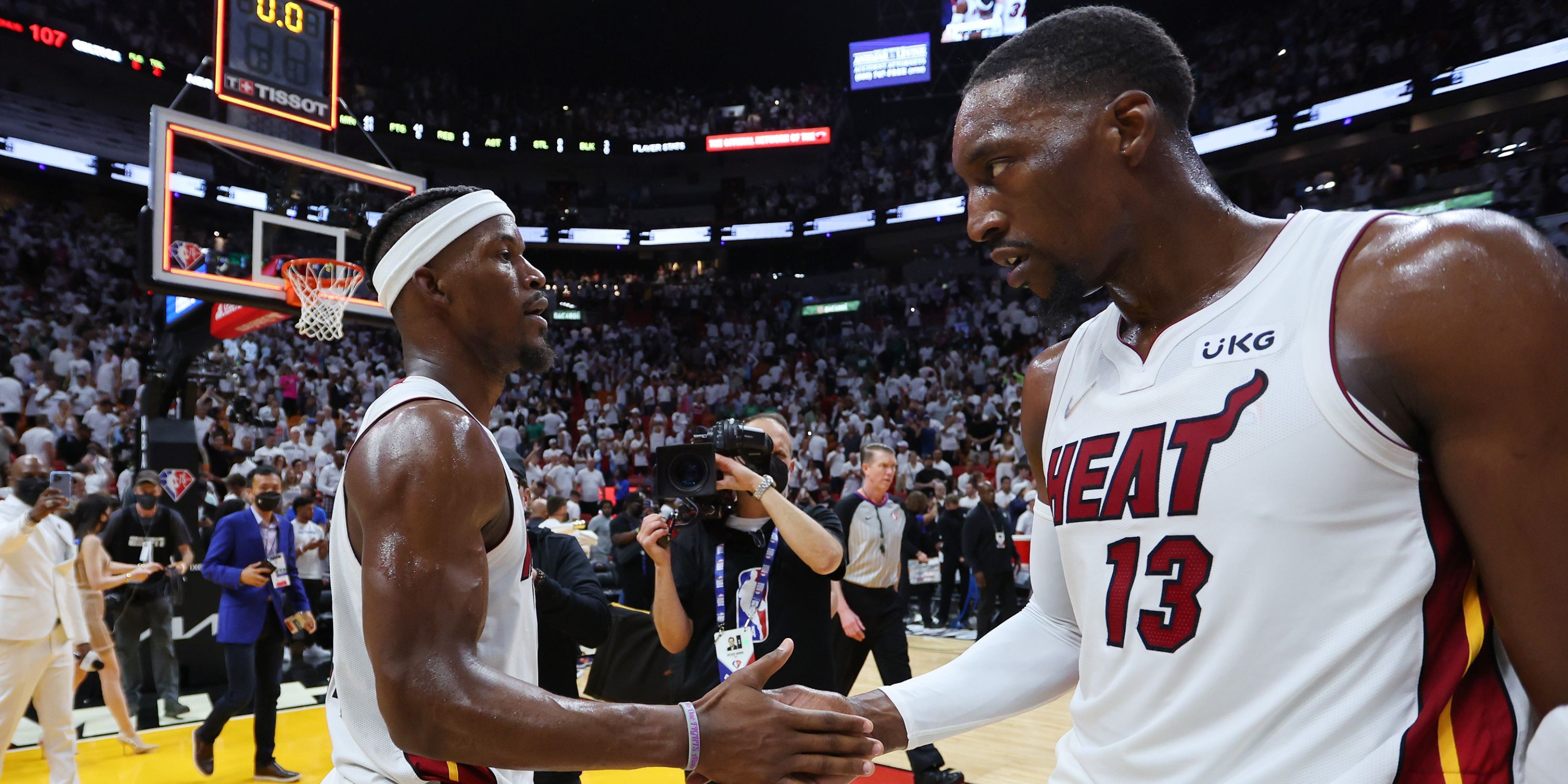 Jimmy Butler and Bam Adebayo of the Miami Heat shake hands after a game.