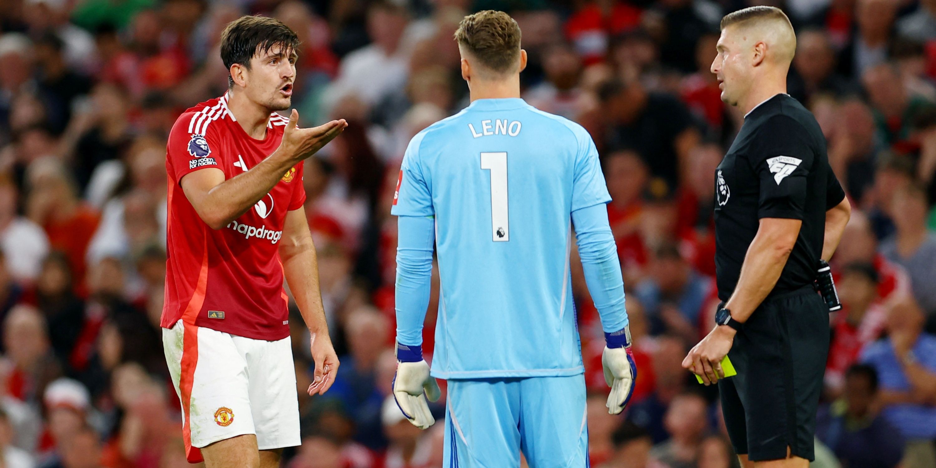 Harry Maguire arguing with Bernd Leno