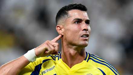 Cristiano Ronaldo pointing to his ear for Al Nassr