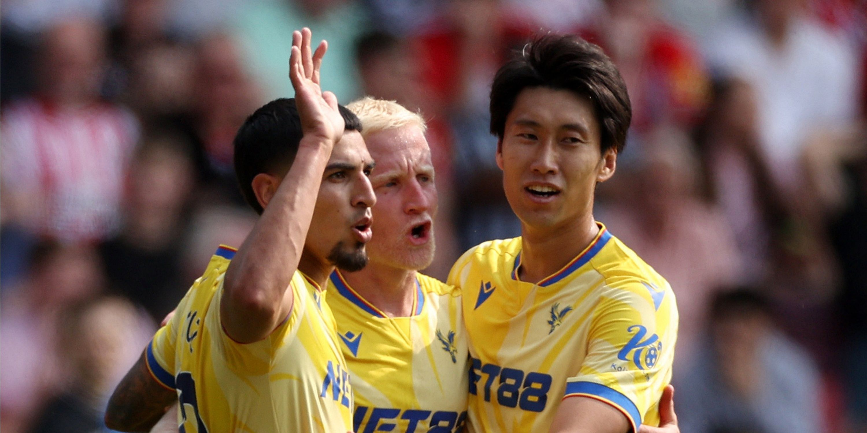 Crystal Palace players celebrate a goal against Brentford