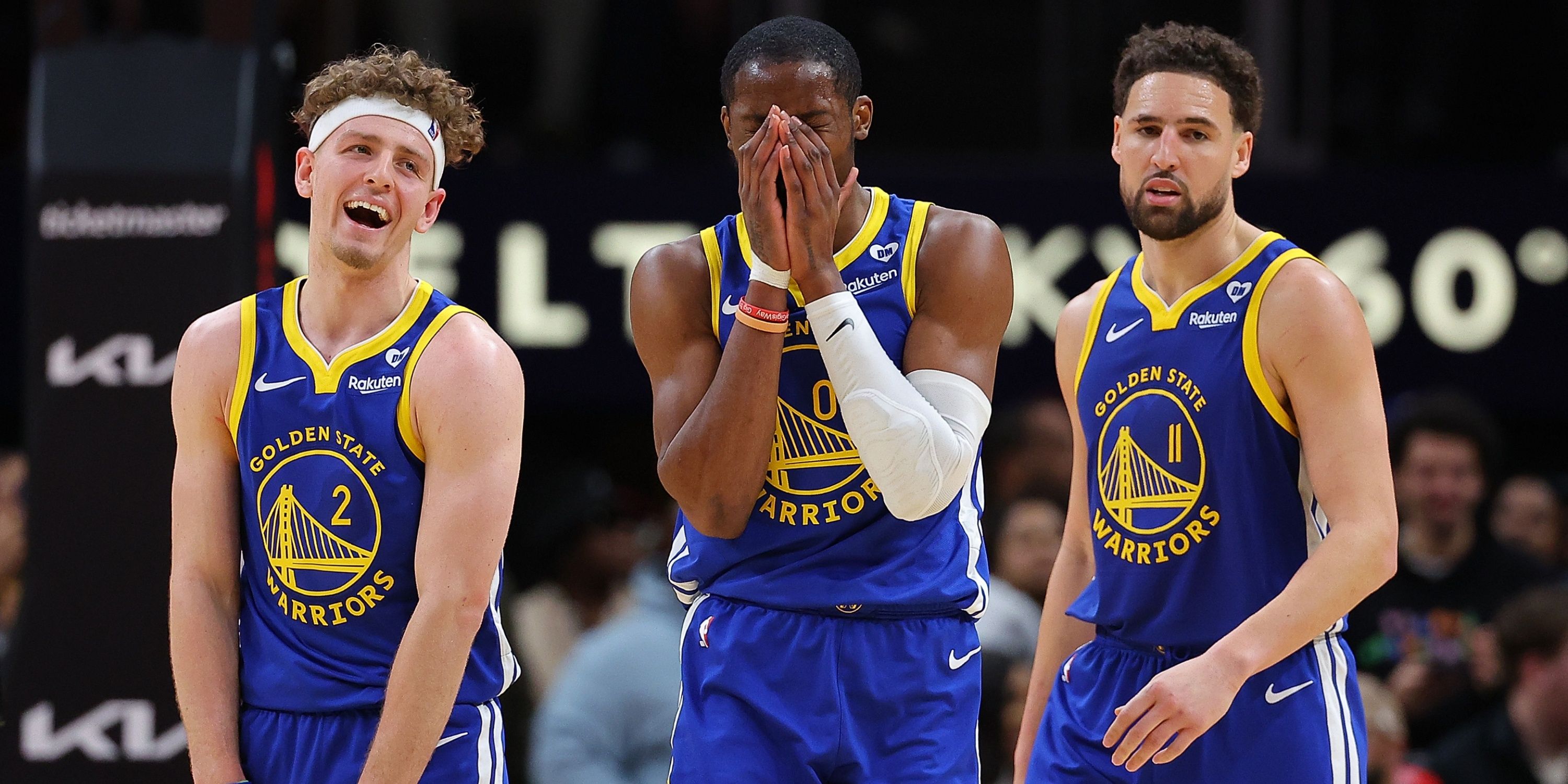 Brandin Podziemski, Jonathan Kuminga and Klay Thompson of the NBA's Golden State Warriors.