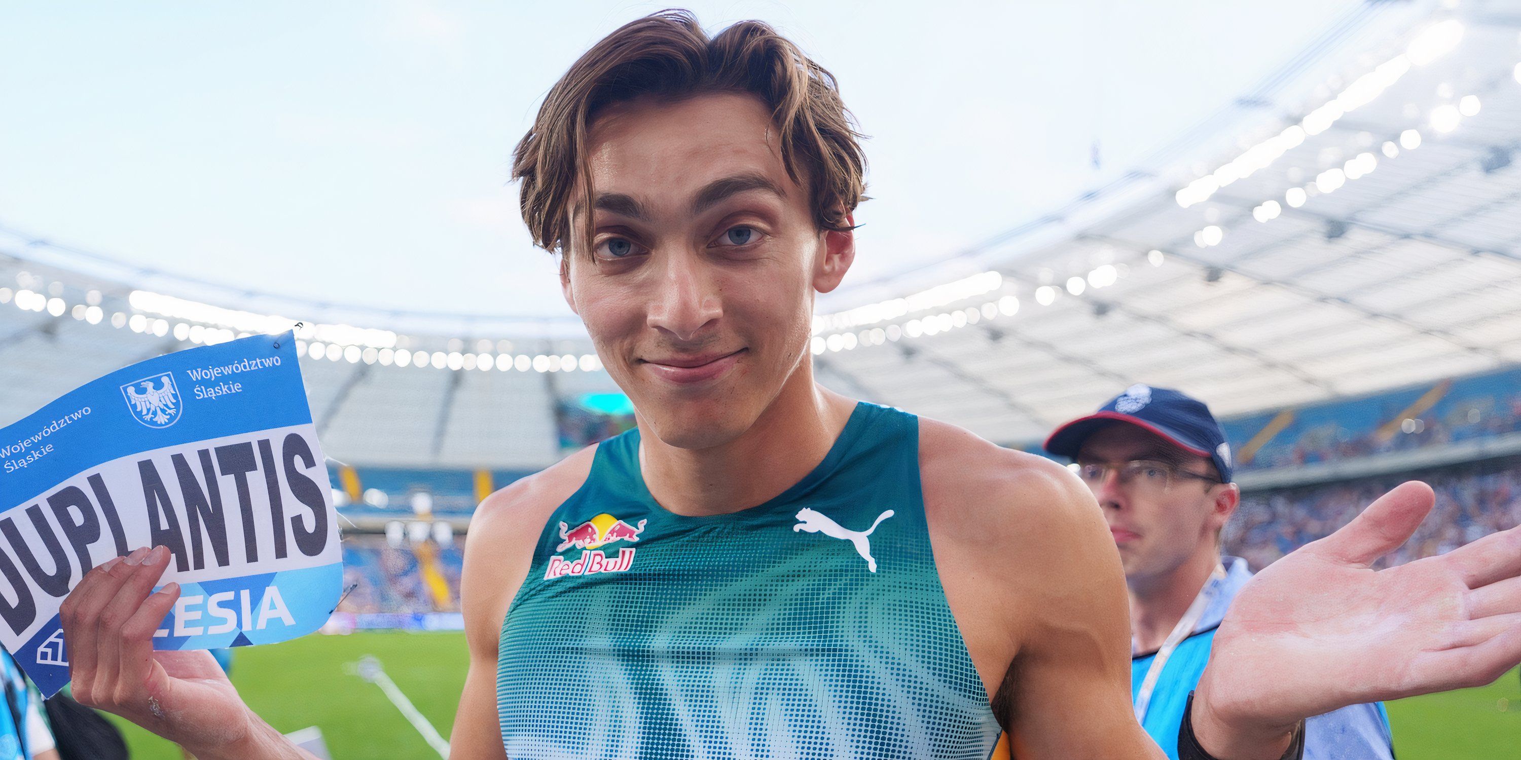 Athlete celebrating a record-breaking achievement after competition