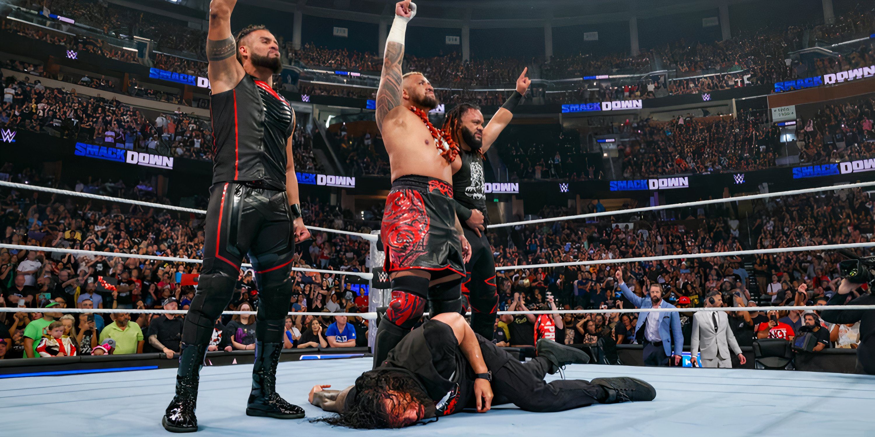 The Bloodline Stand Over Roman Reigns