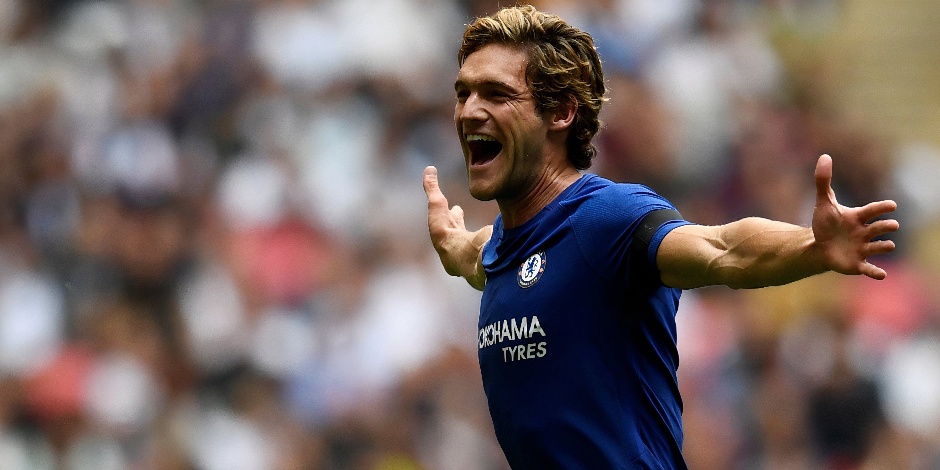 Marcos Alonso celebrates scoring against Tottenham Hotspur.
