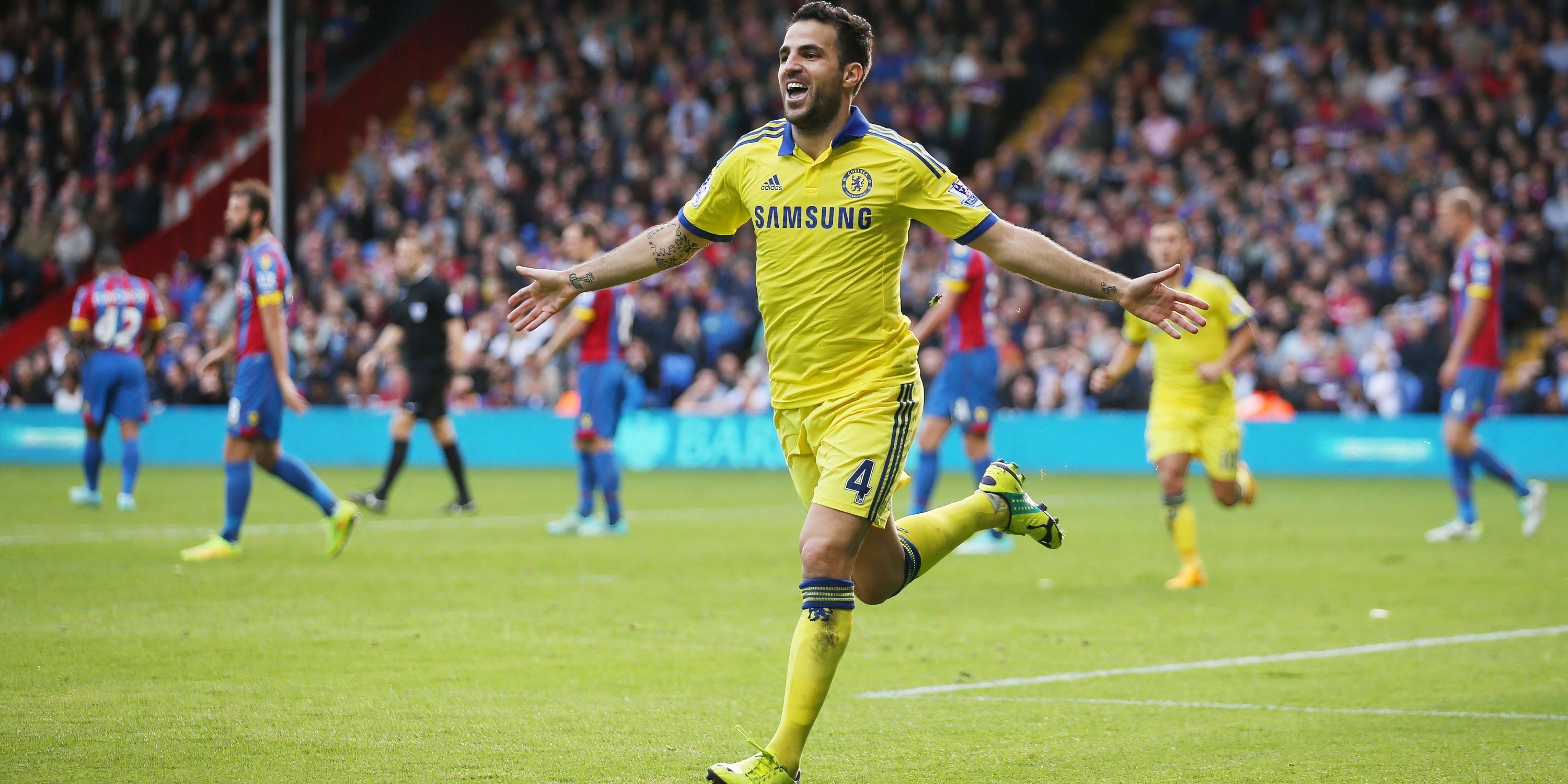 Cesc Fabregas celebrates a goal for Chelsea.