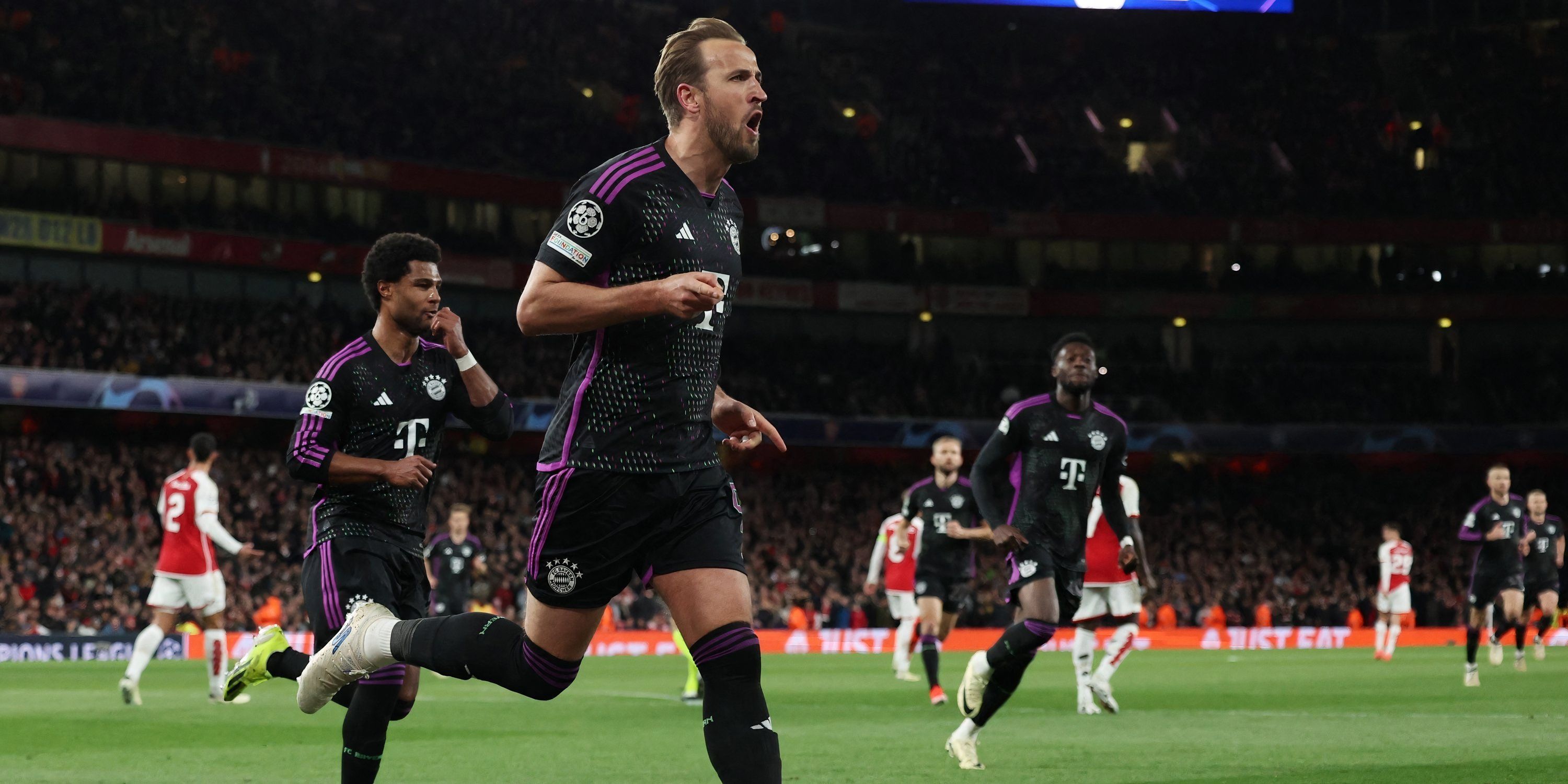 Harry Kane celebrates a goal for Bayern Munich against Arsenal.