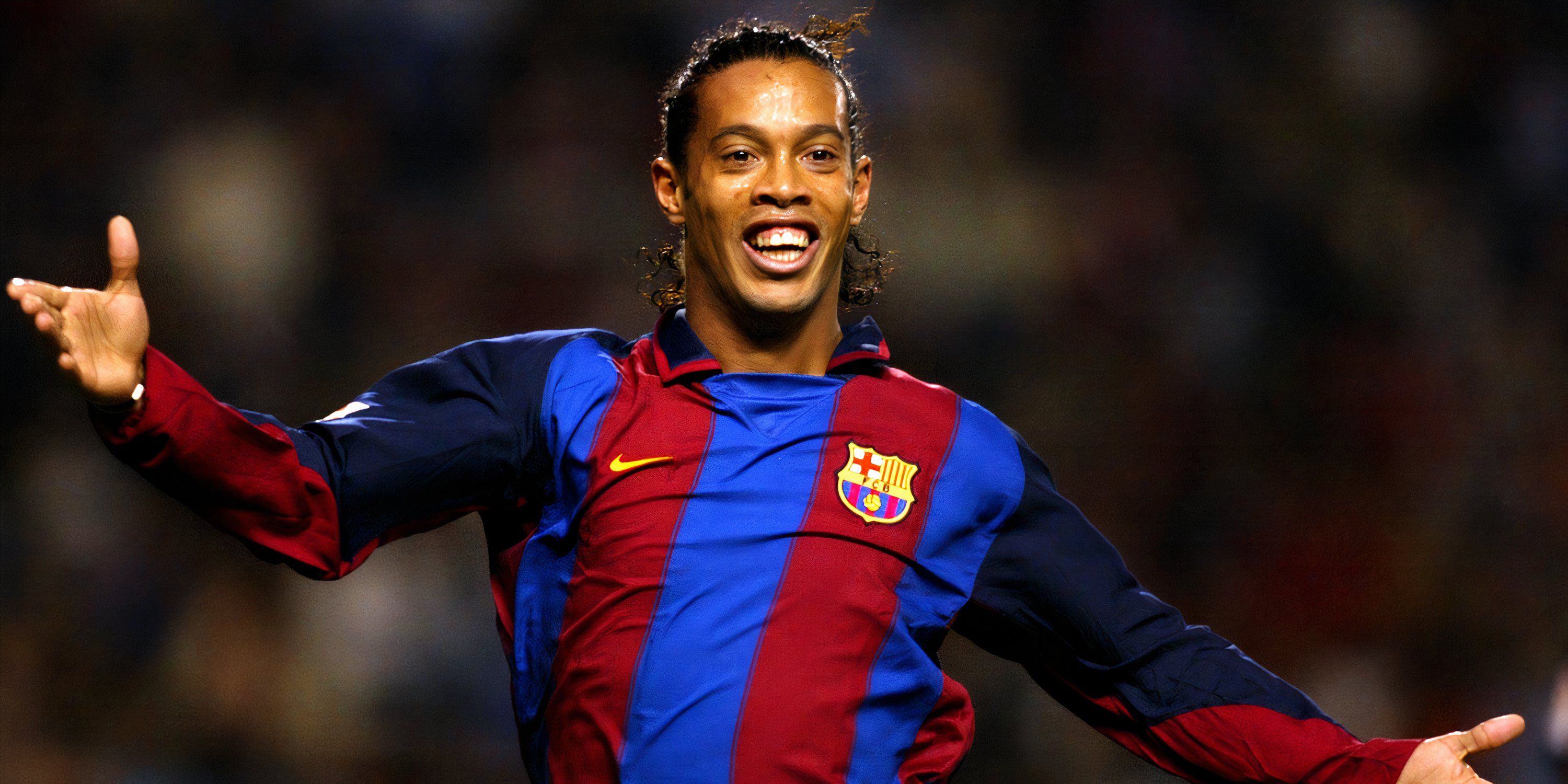 Ronaldinho celebrates Barcelona's goal.