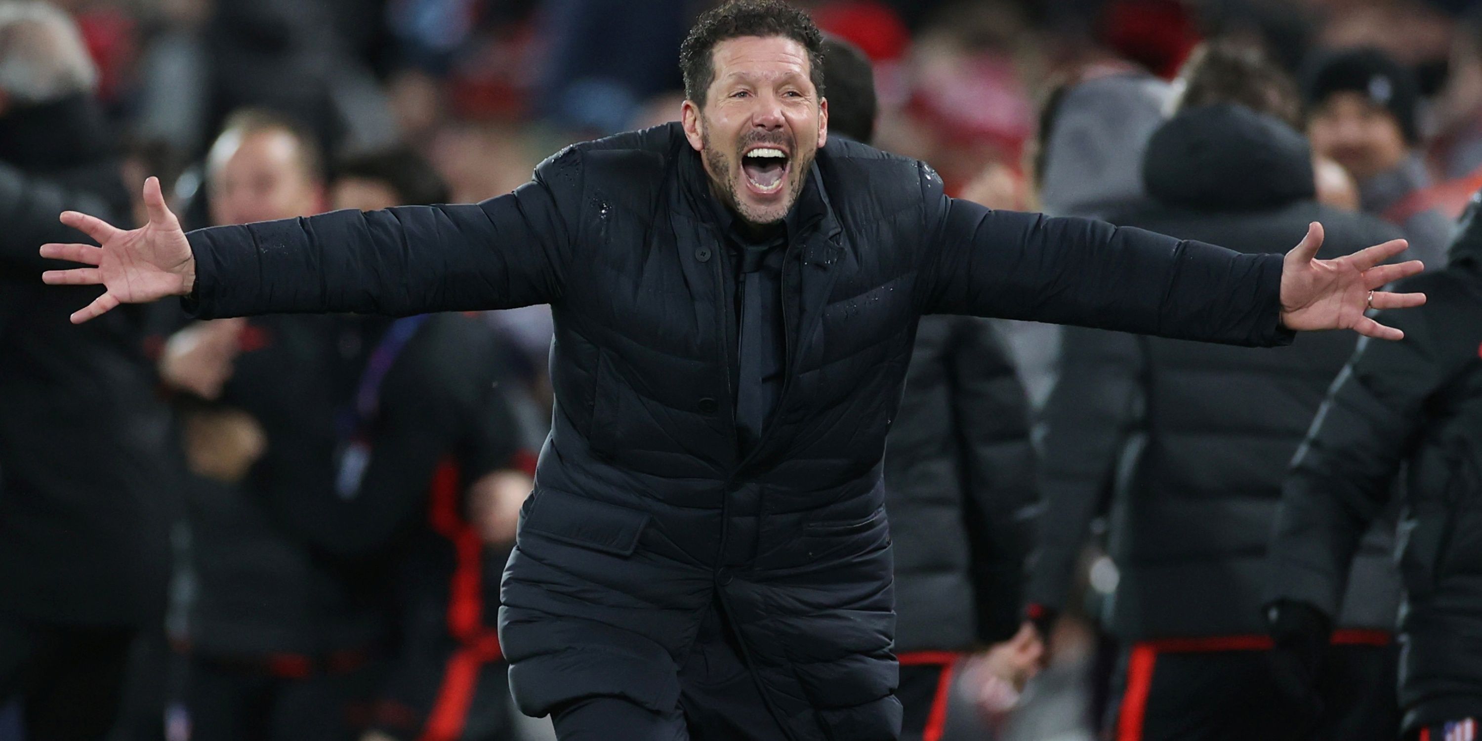 Atletico Madrid manager Diego Simeone celebrating with his arms outstretched