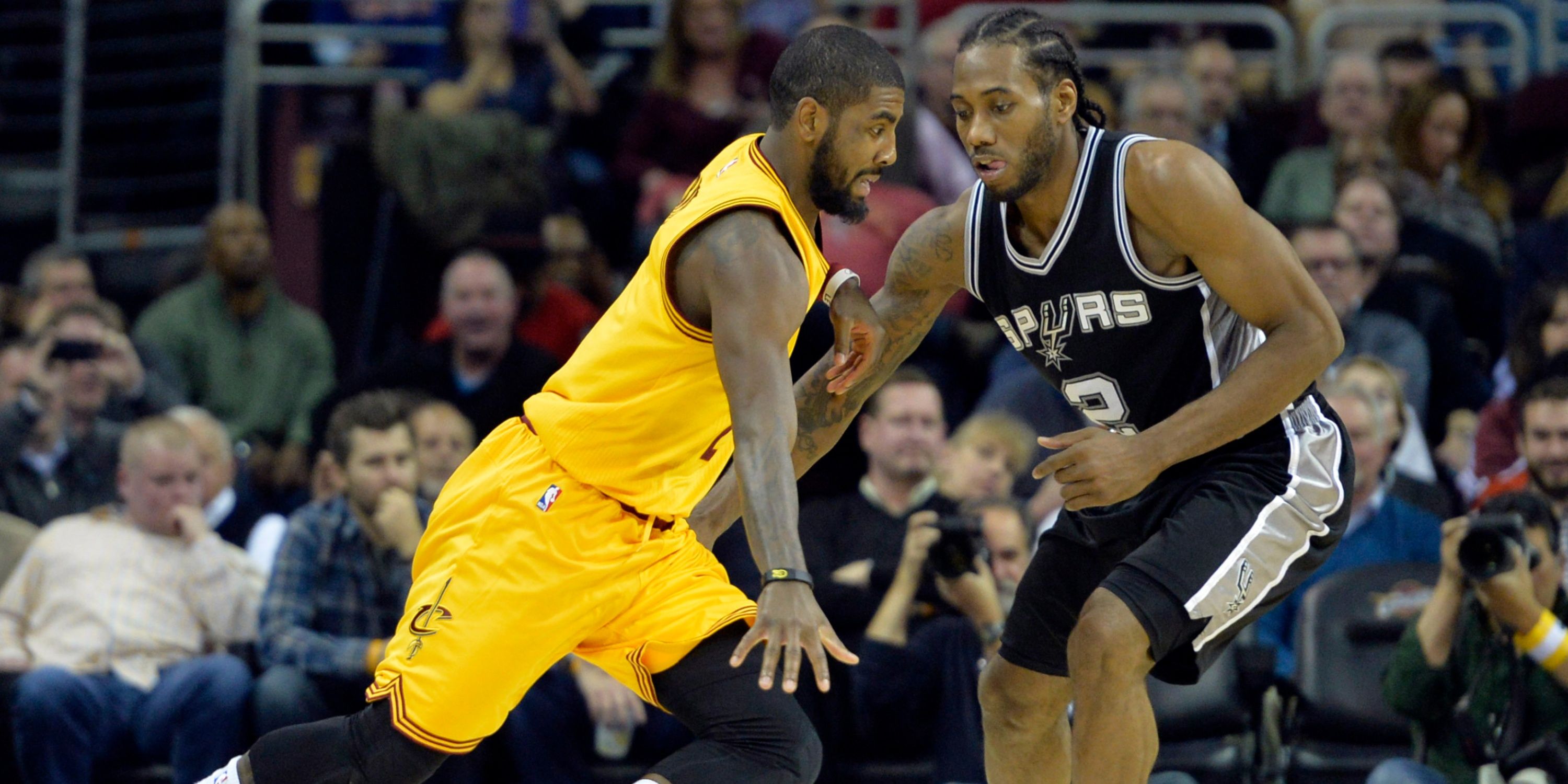 Kyrie Irving, Cleveland Cavaliers; Kawhi Leonard, San Antonio Spurs during an NBA game.