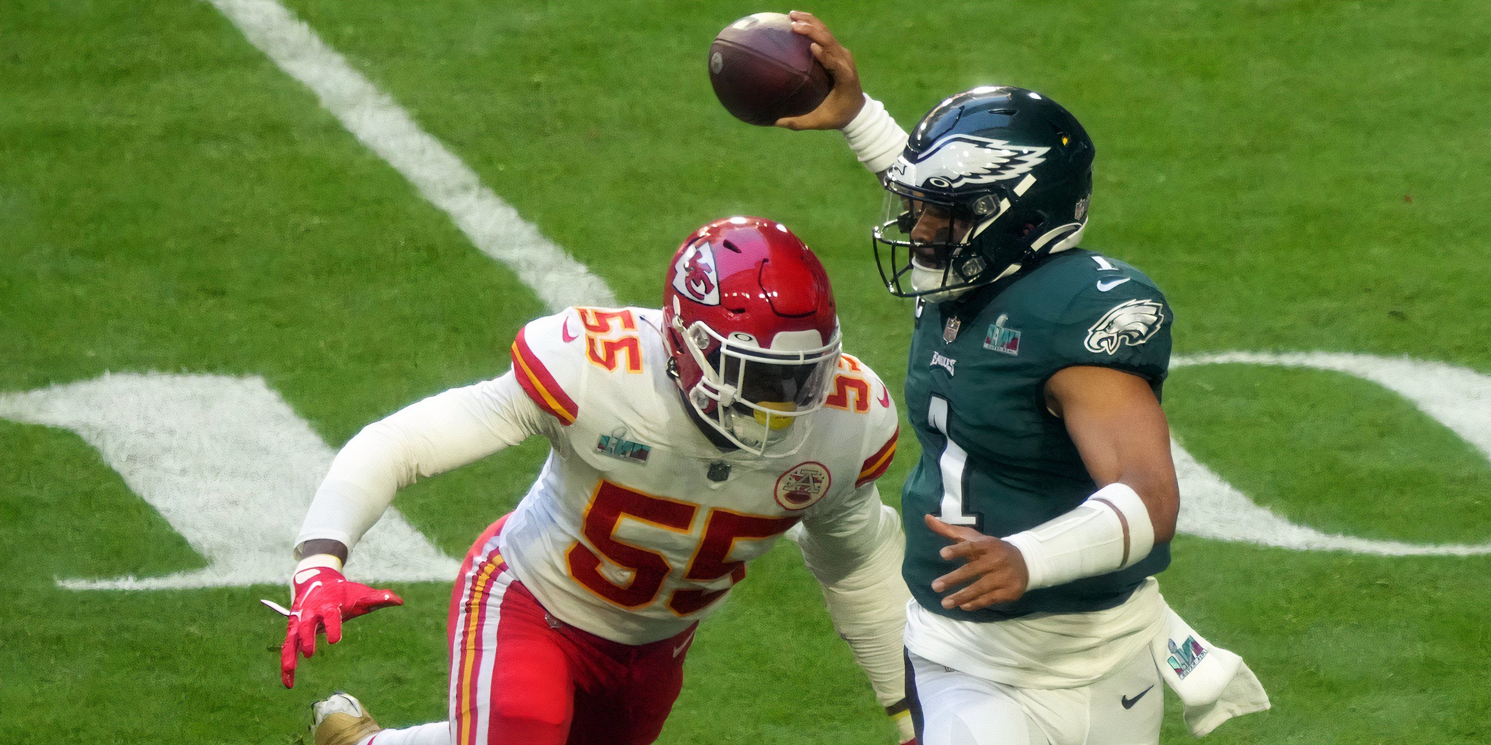 Philadelphia Eagles quarterback Jalen Hurts (1) throws a pass against Kansas City Chiefs defensive end Frank Clark (55) during the first quarter in Super Bowl LVII at State Farm Stadium in Glendale on Feb. 12, 2023