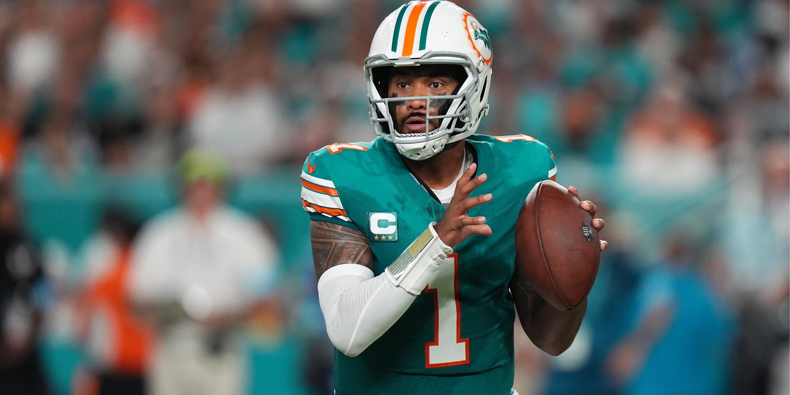 Miami Dolphins quarterback Tua Tagovailoa (1) drops back with the ball against the Buffalo Bills during the first half at Hard Rock Stadium