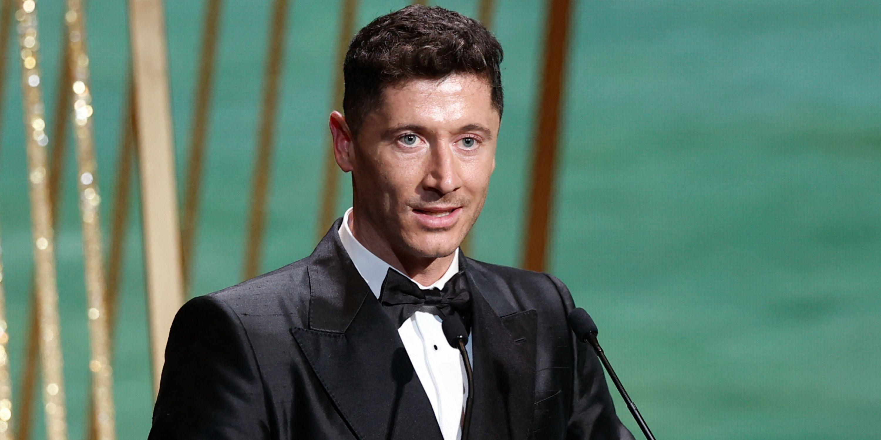 Robert Lewandowski speaking at an awards ceremony 