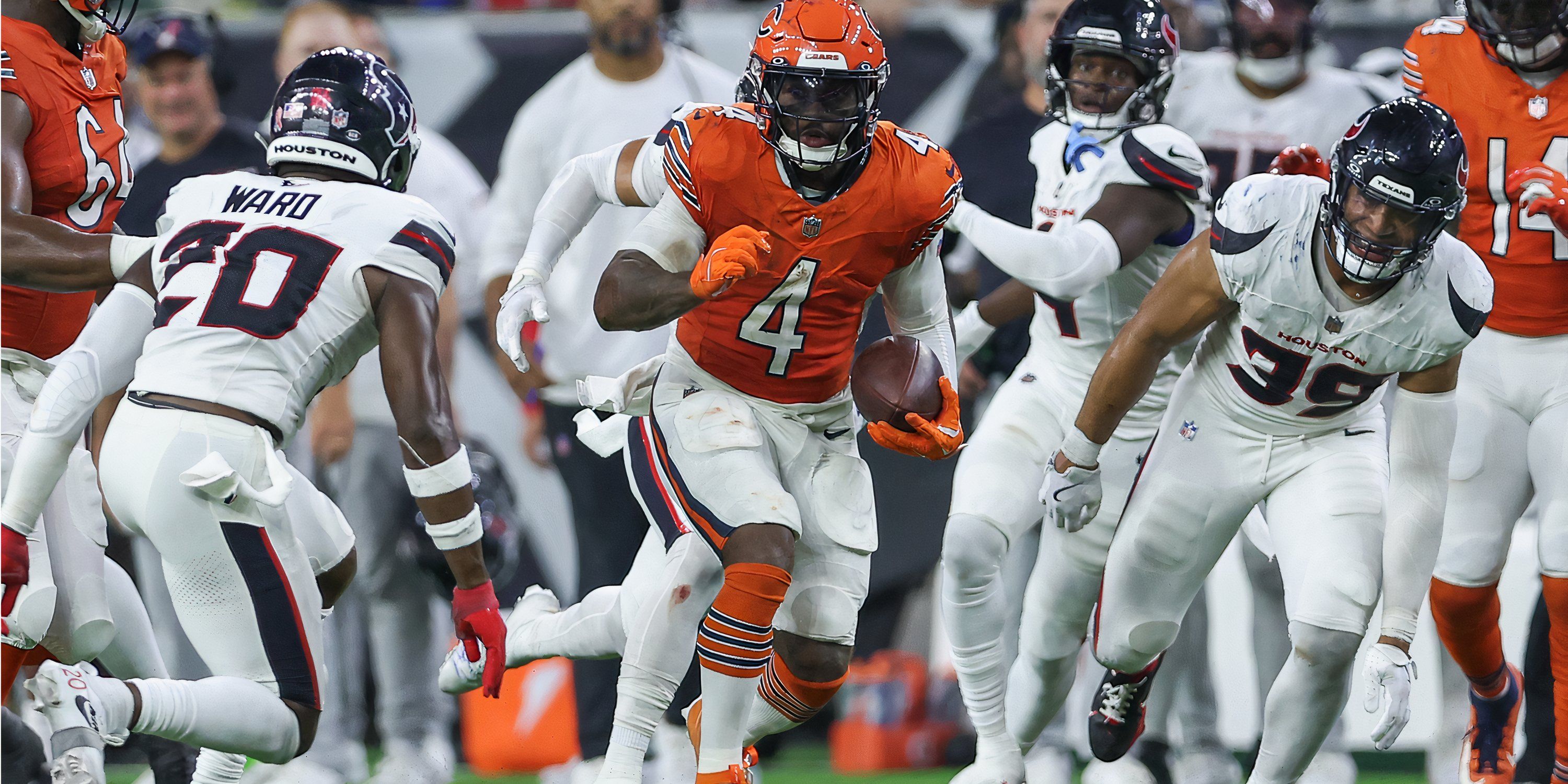 Chicago Bears running back D'Andre Swift (4) runs with the ball during the third quarter against the Houston Texans at NRG Stadium.