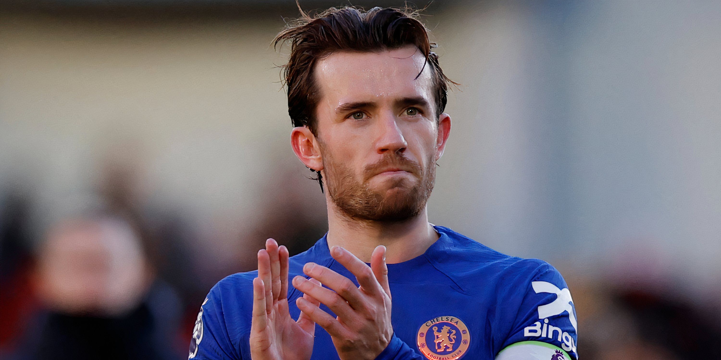 Chelsea left-back Ben Chilwell applauding the supporters