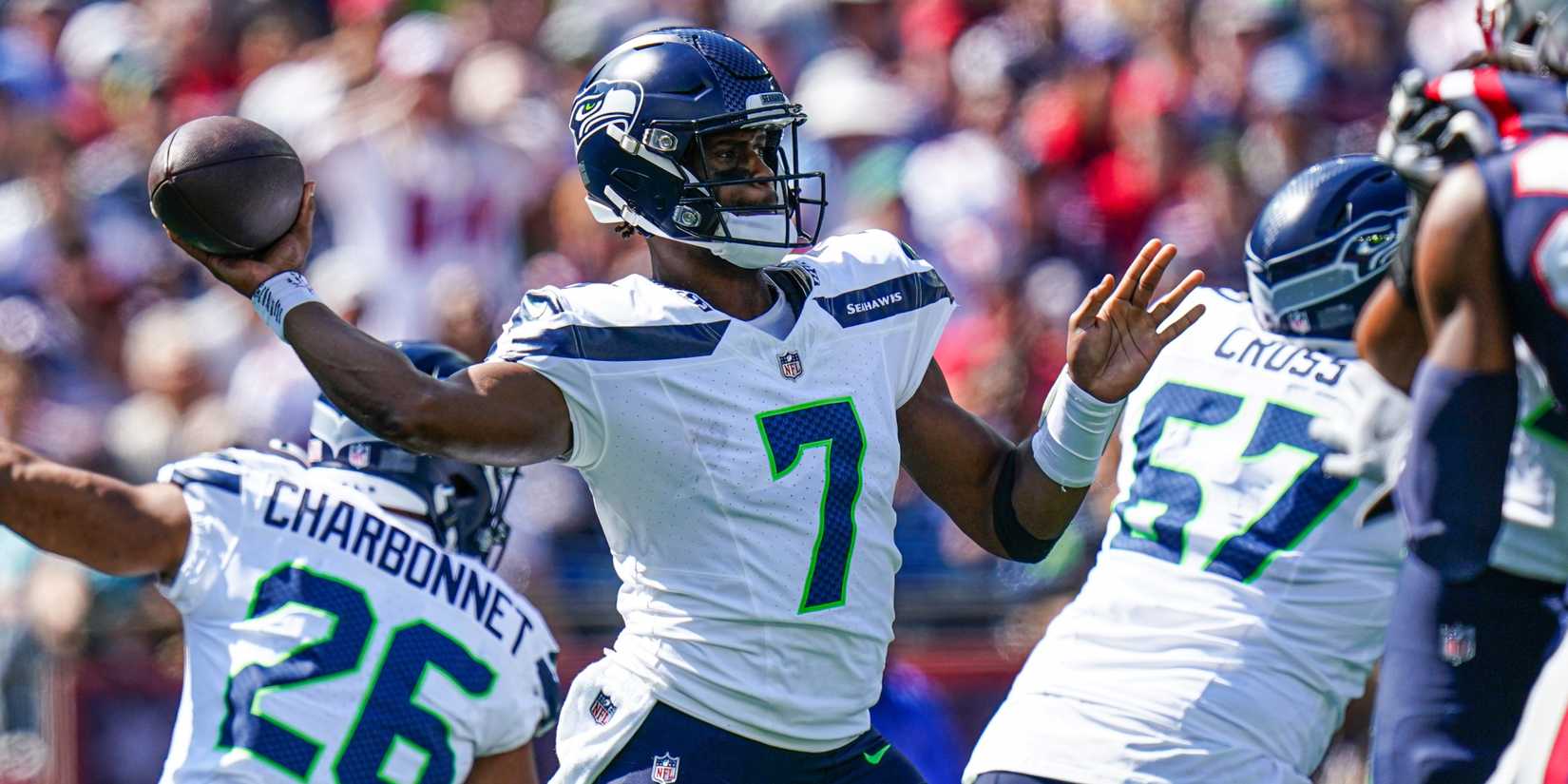 Seahawks QB Geno Smith attempts a pass
