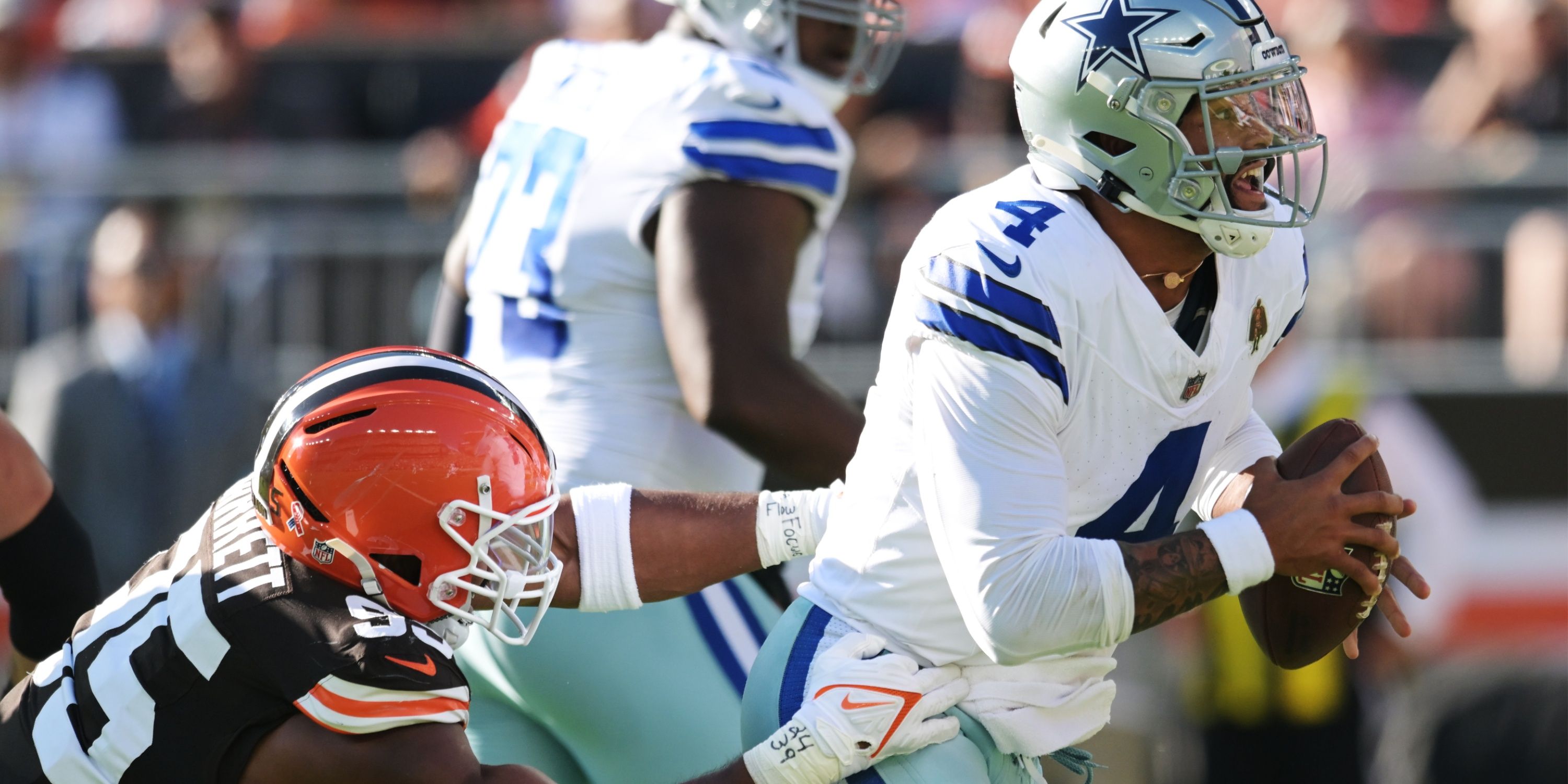 Cowboys QB Dak Prescott is sacked by Myles Garrett