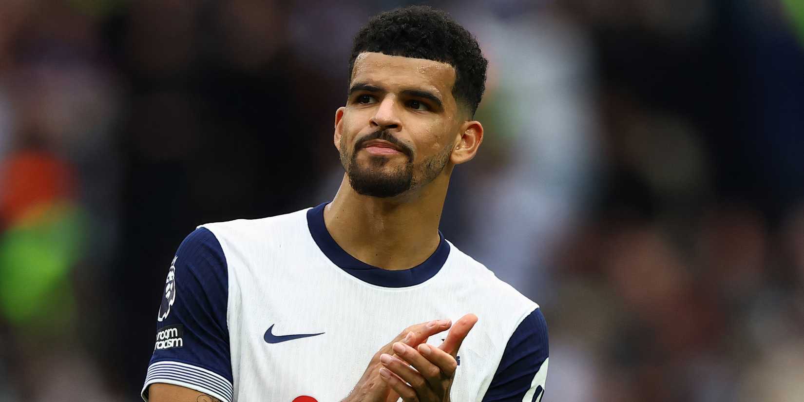 Tottenham Hotspur striker Dominic Solanke applauding the supporters