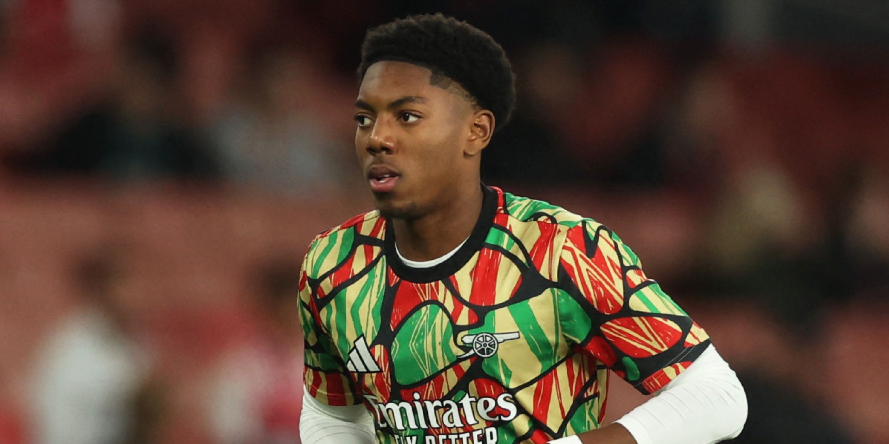 Arsenal's Myles Lewis-Skelly during the warm up before the match vs Bolton