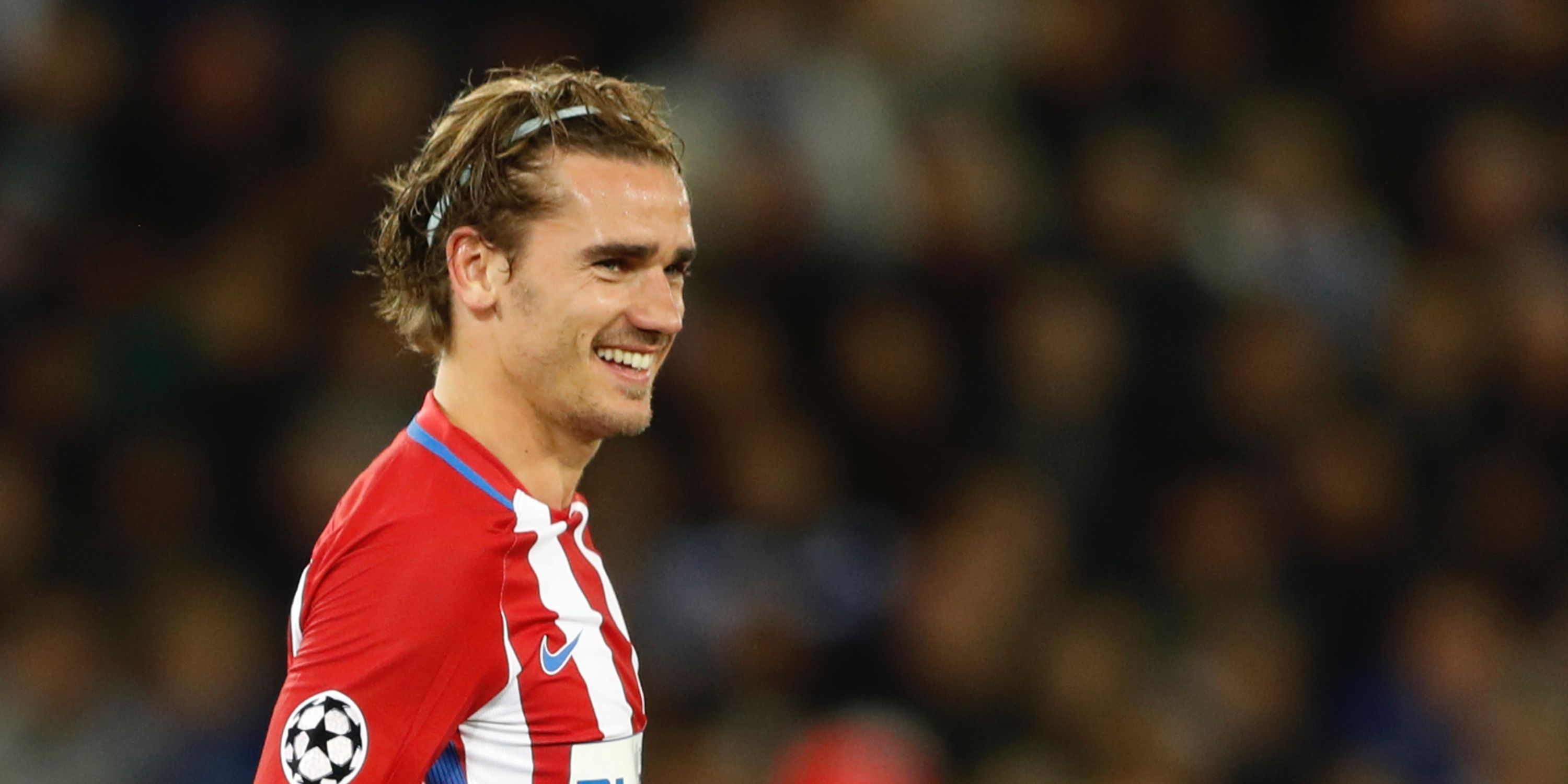 Atletico Madrid attacker Antoine Griezmann smiling