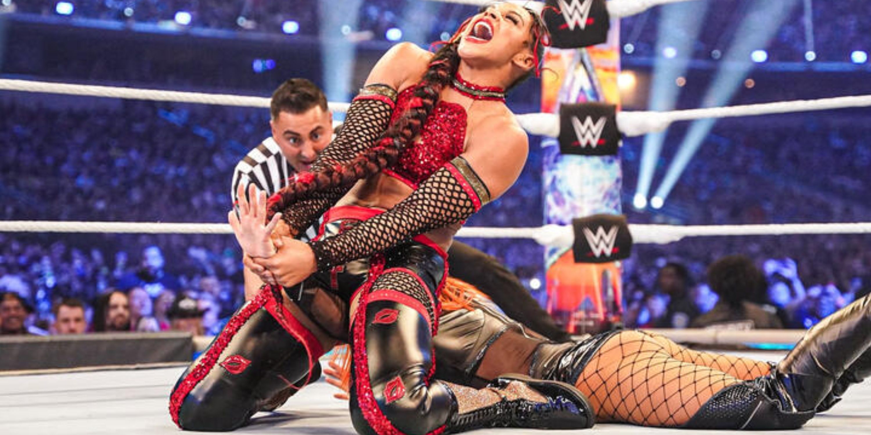 Bianca Belair locks in a submission on Becky Lynch at WrestleMania 38