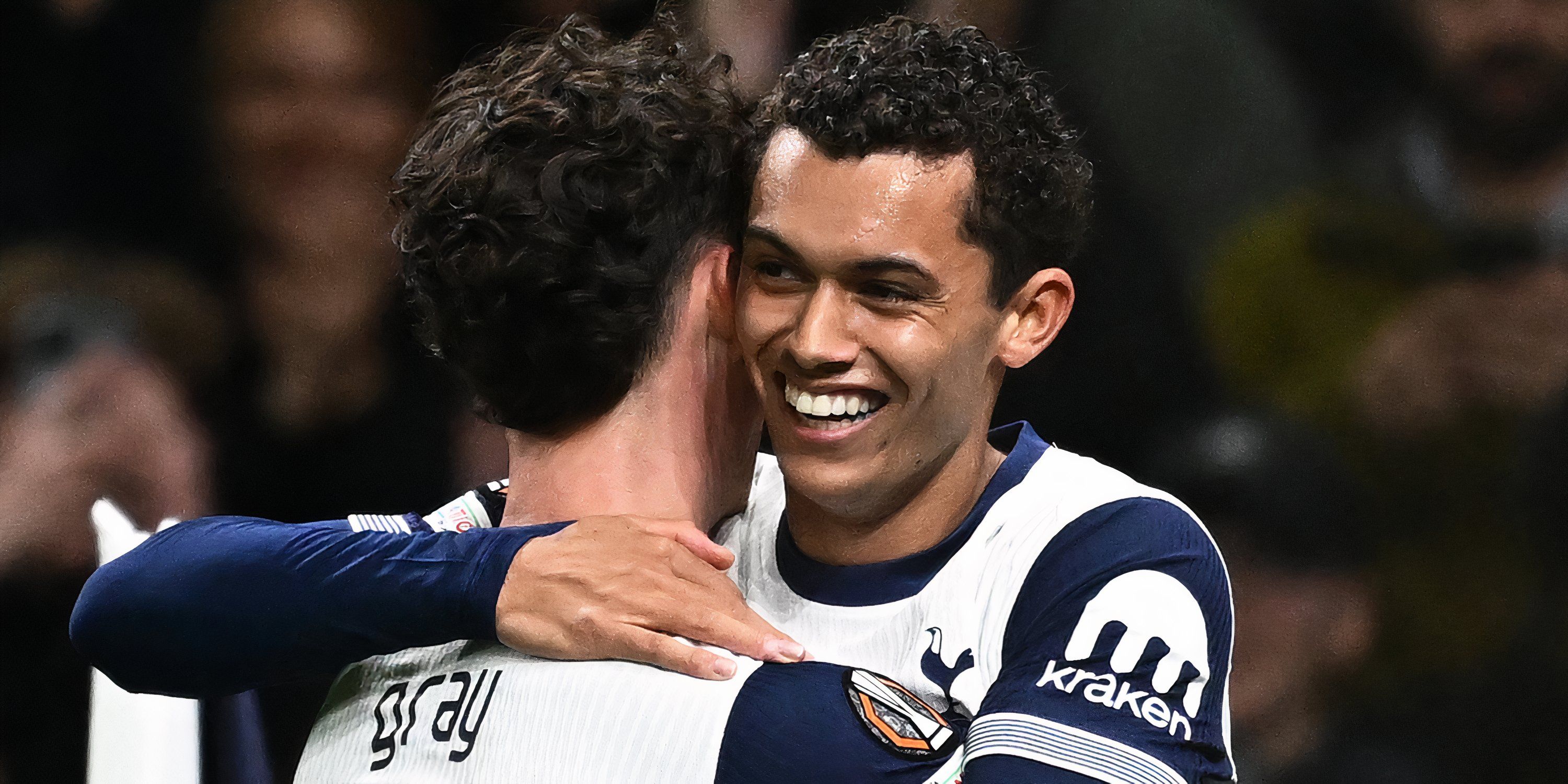 Brennan Johnson celebrates scoring for Tottenham with Archie Gray