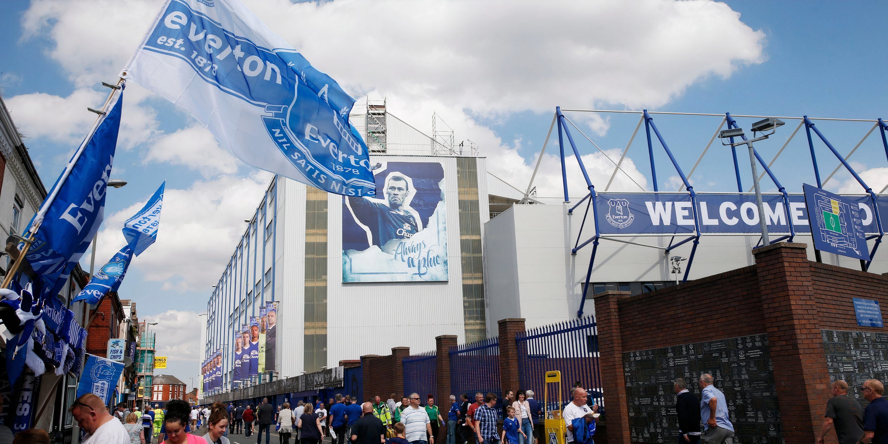 Everton fans wandering the streets outside Goodison Park.