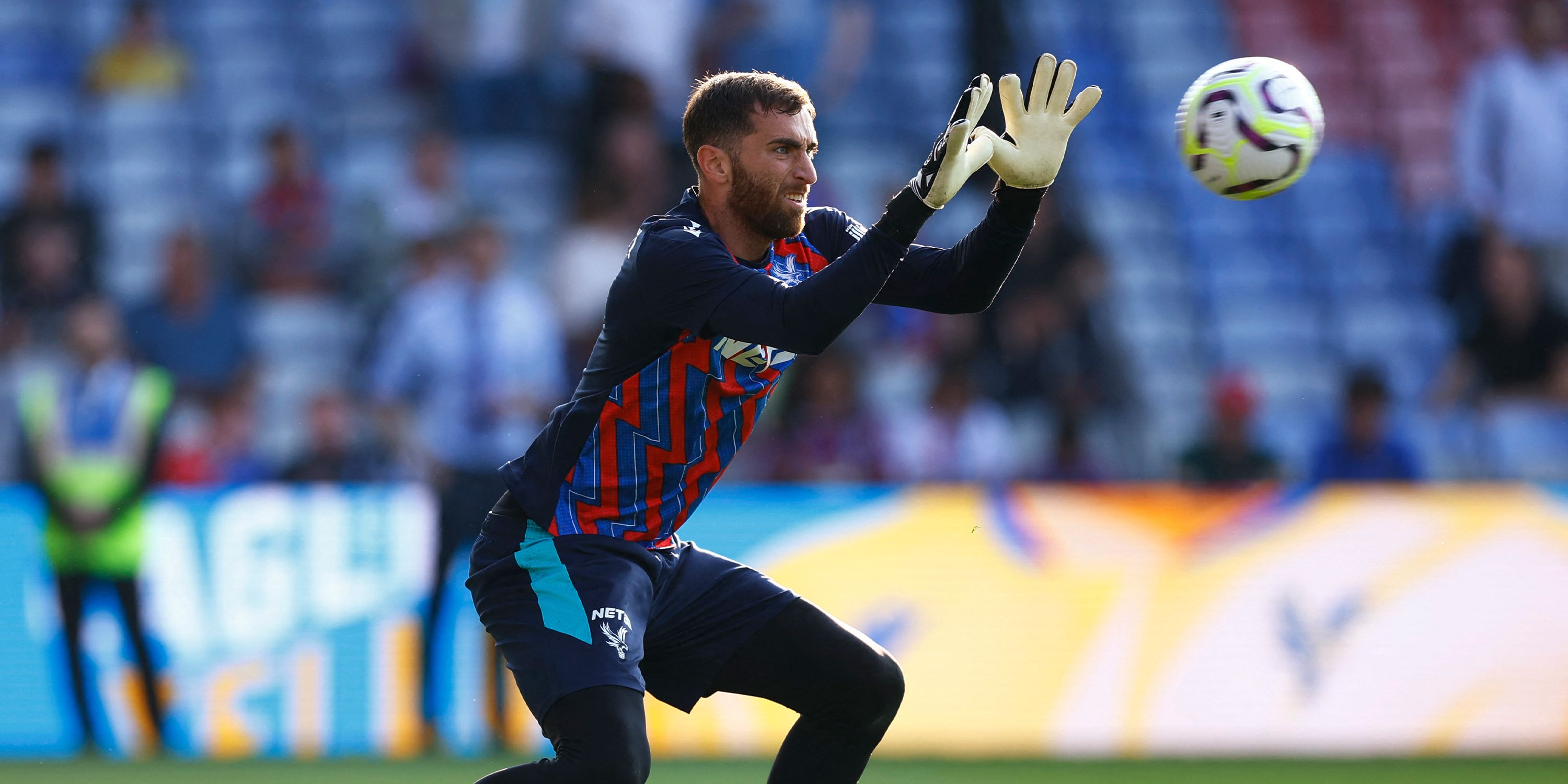 Goalkeeper Matt Turner warms up for Crystal Palace