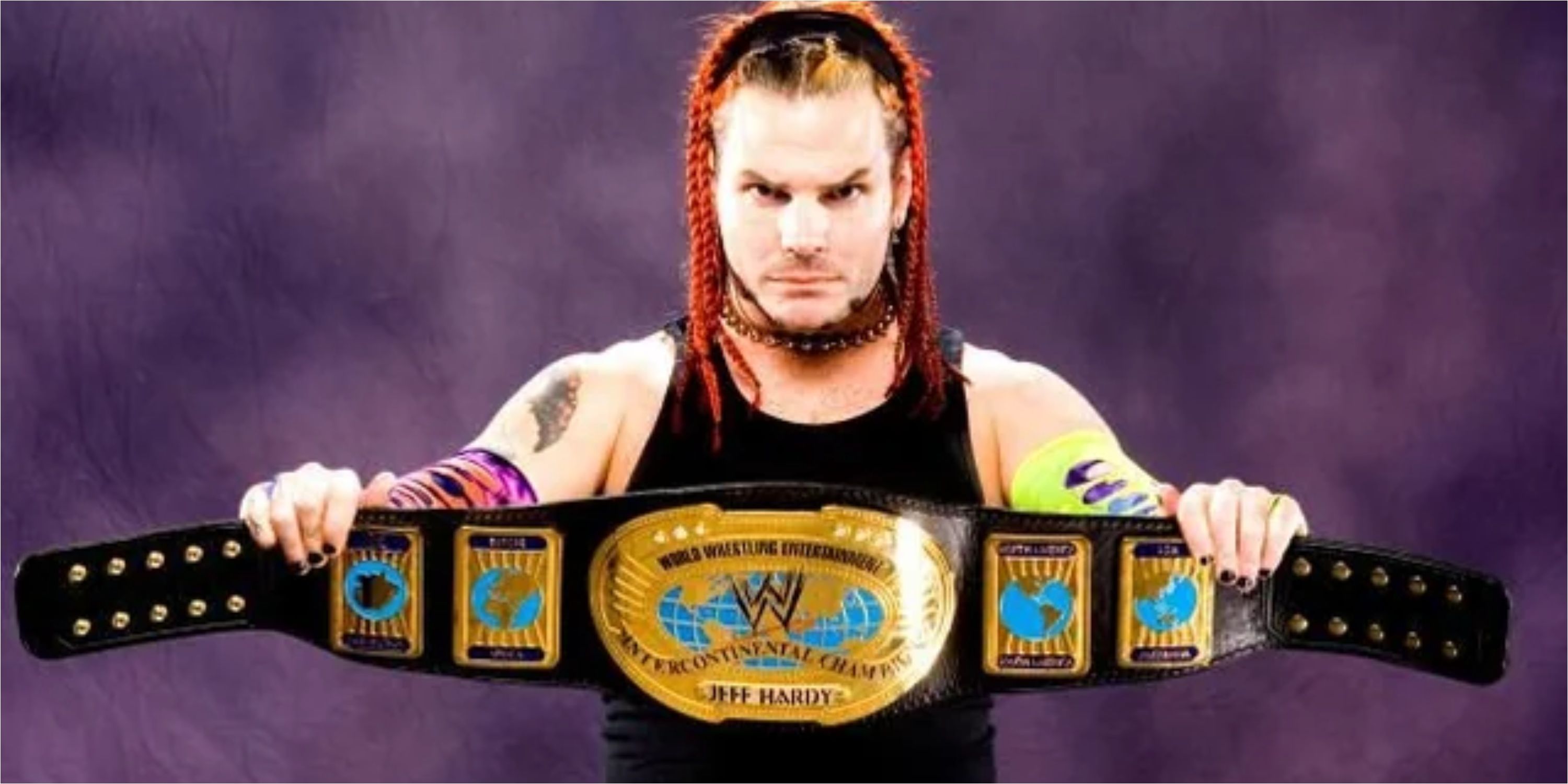 Jeff Hardy holding the WWE Intercontinental Championship