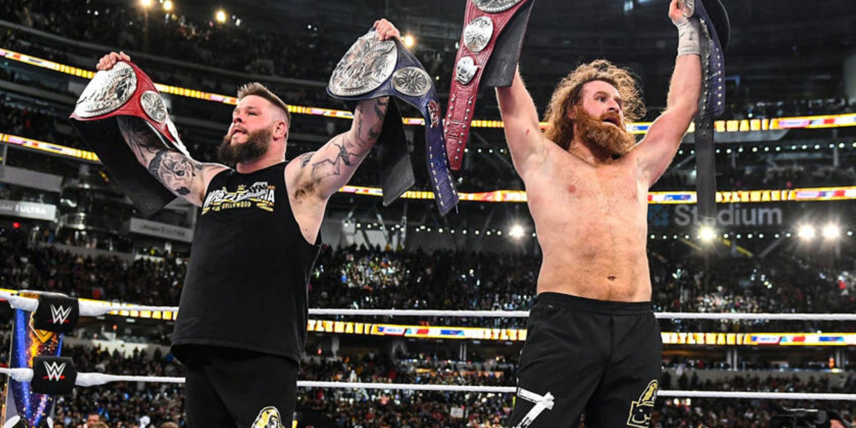 Kevin Owens and Sami Zayn raise the Undisputed WWE Tag Team Championships at WrestleMania 39