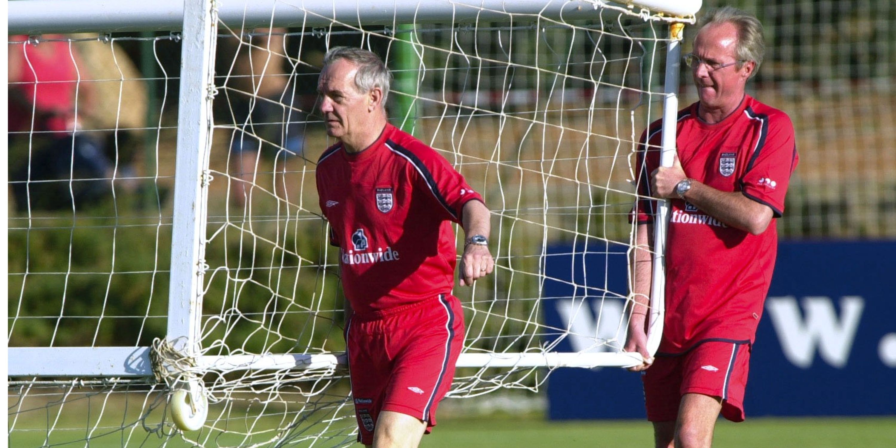 Tord Grip helps Sven Goran Eriksson