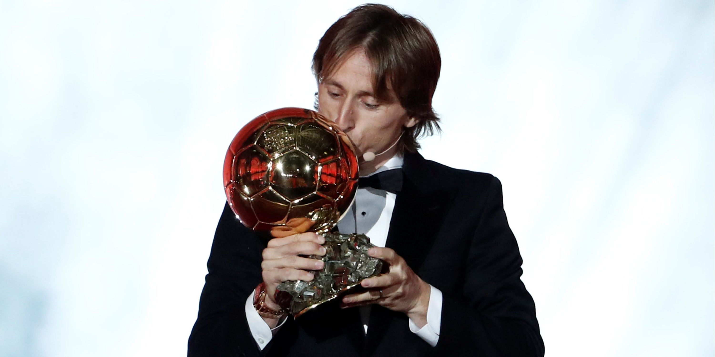 Luka Modric kissing his Ballon d'Or award