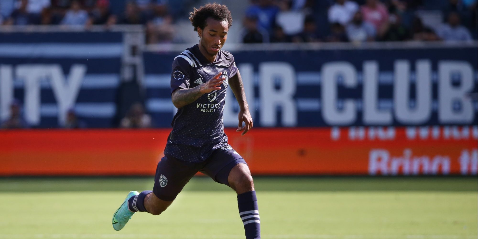 Sporting Kansas City forward Gianluca Busio (10) running with the ball at Children's Mercy Park