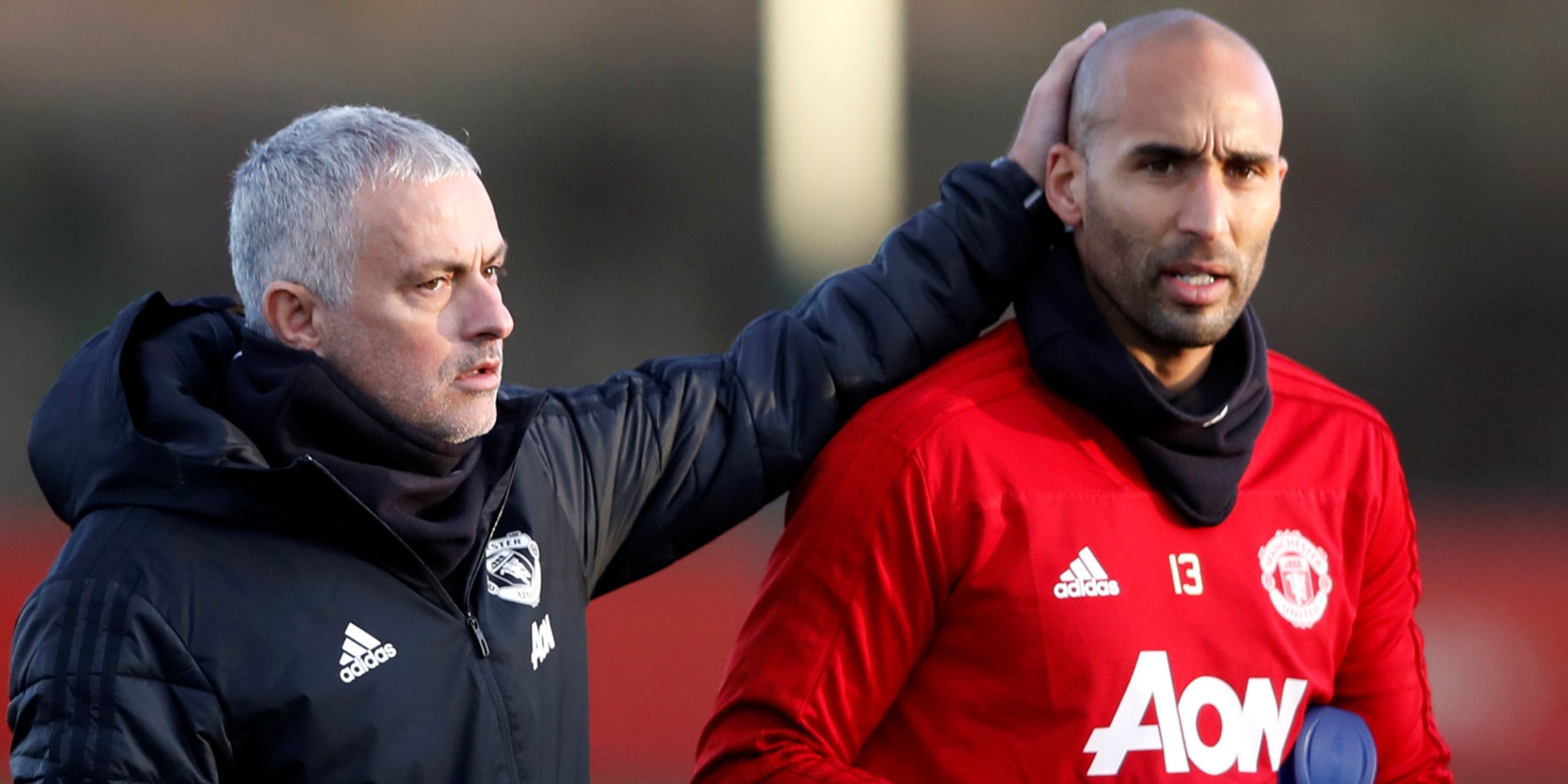 Manchester United manager Jose Mourinho and Lee Grant during training