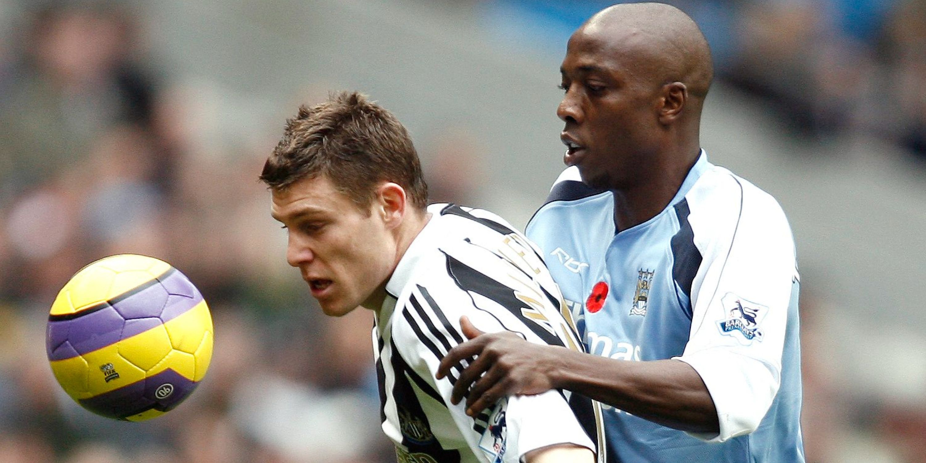 Newcastle's James Milner in action against Man City's Hatem Trabelsi